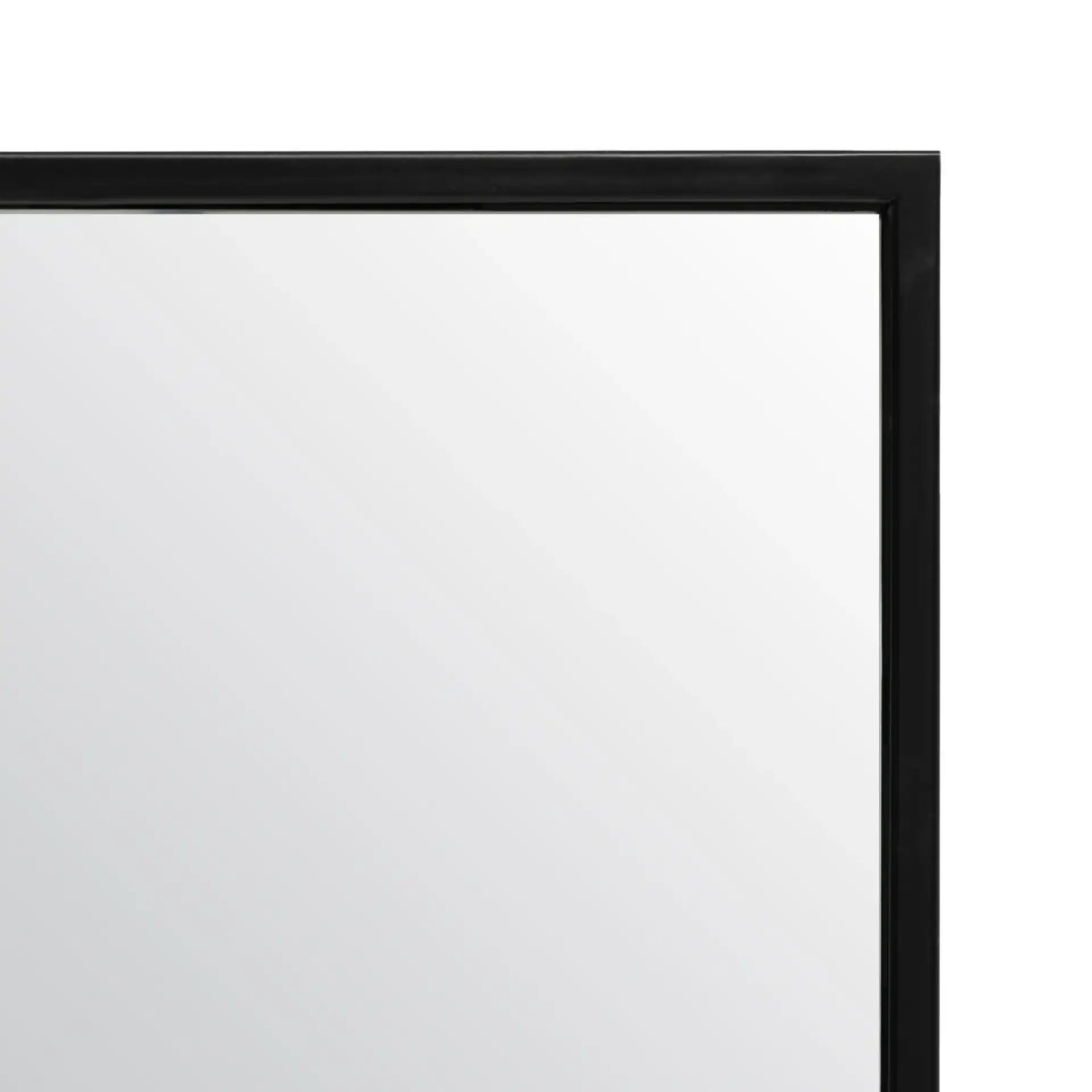 Cala 24-Inch Mirror in Black in a styled room