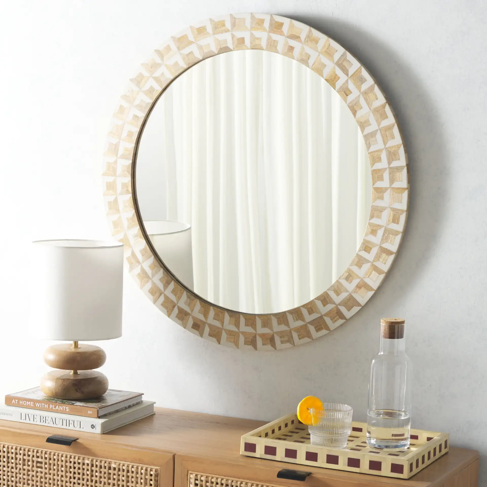 Aria Mirror in Antique Ivory / Natural Brown in a styled room