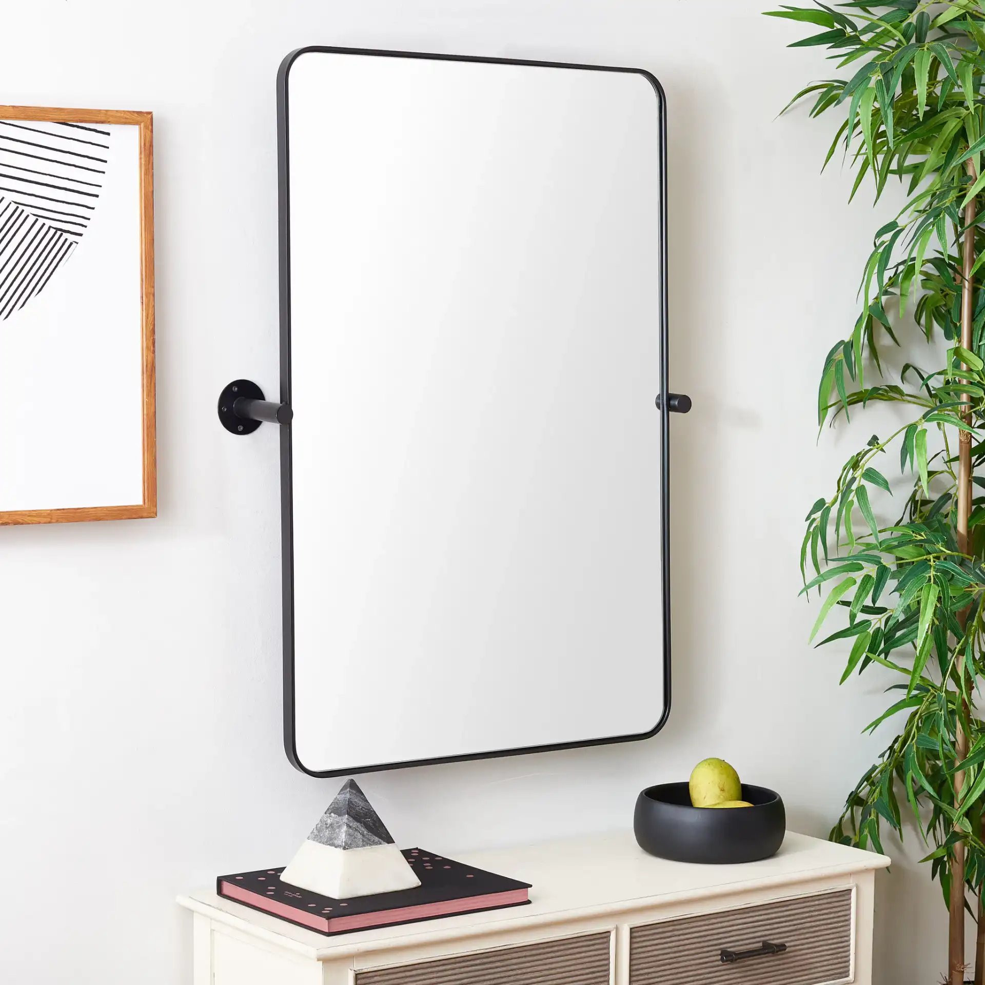 Delinah 24" Mirror in Black in a styled room