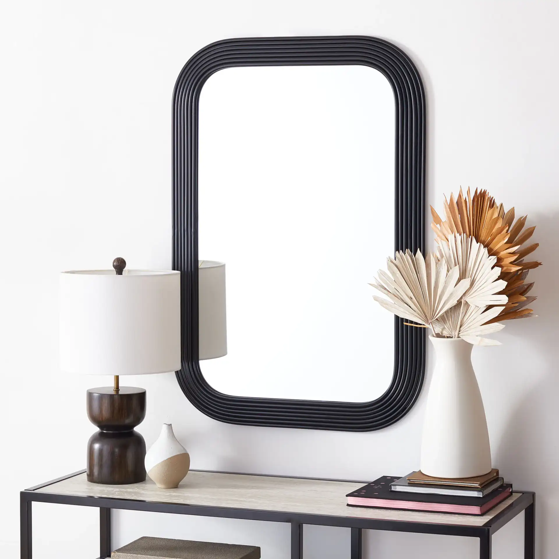 Ahna 24.5-Inch Mirror in Black in a styled room