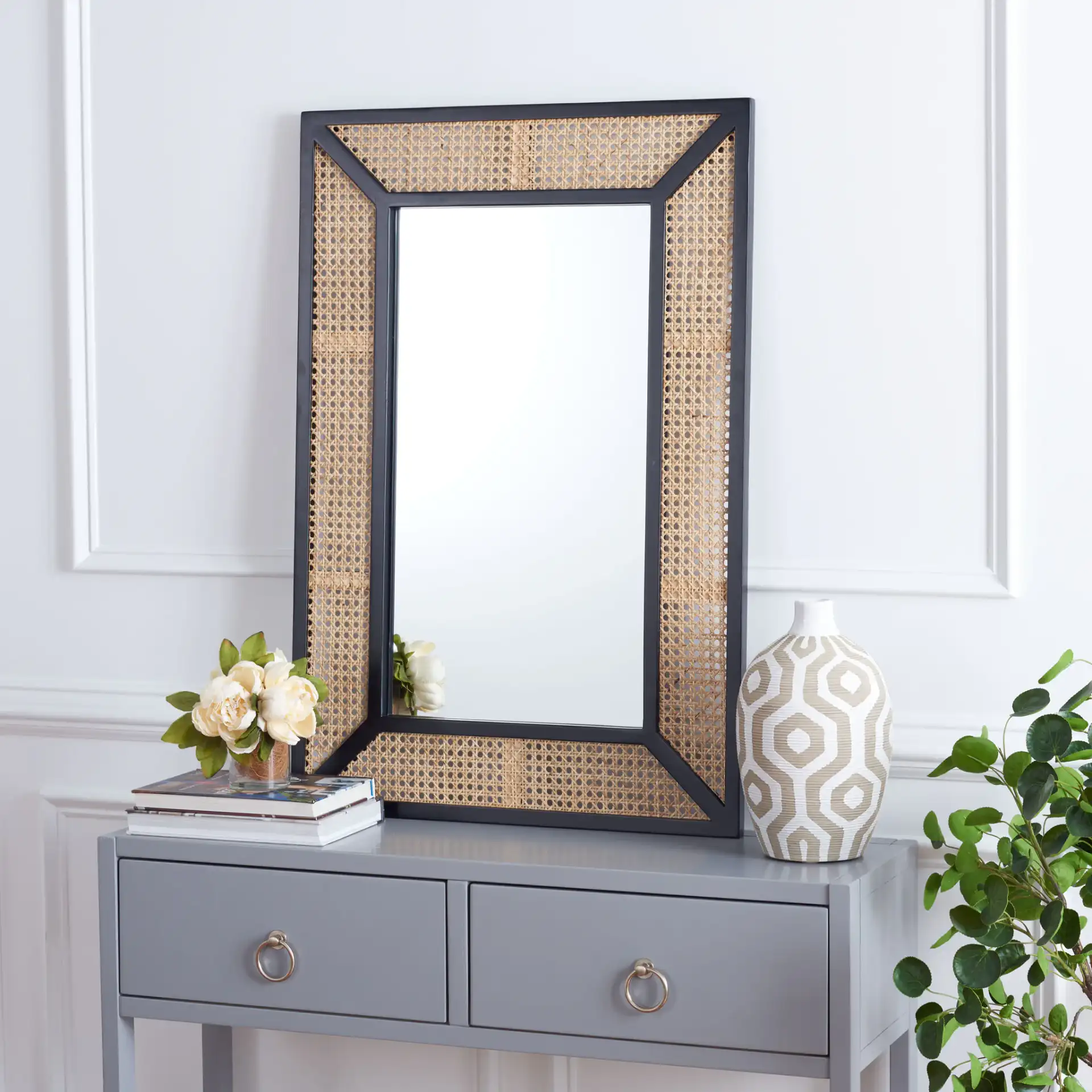 Tulia 24-Inch Mirror in Black / Natural in a styled room