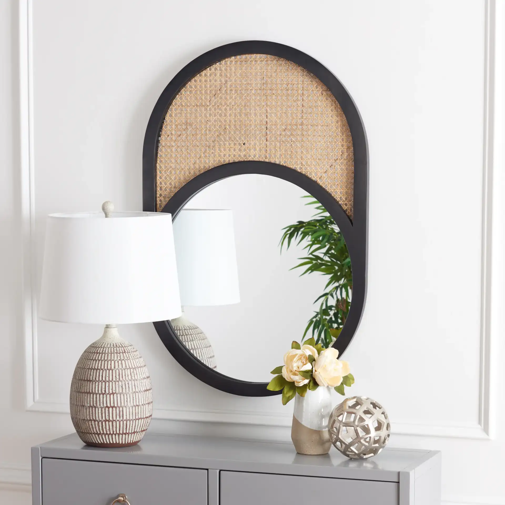 Danya 24-Inch Mirror in Black / Natural in a styled room