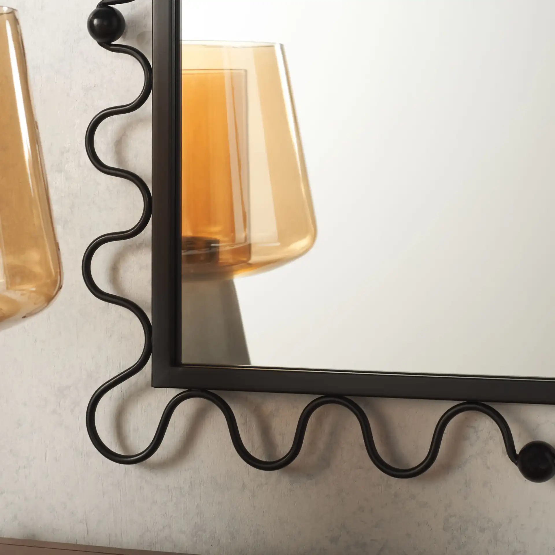Cinq 24-Inch Mirror in Black in a styled room