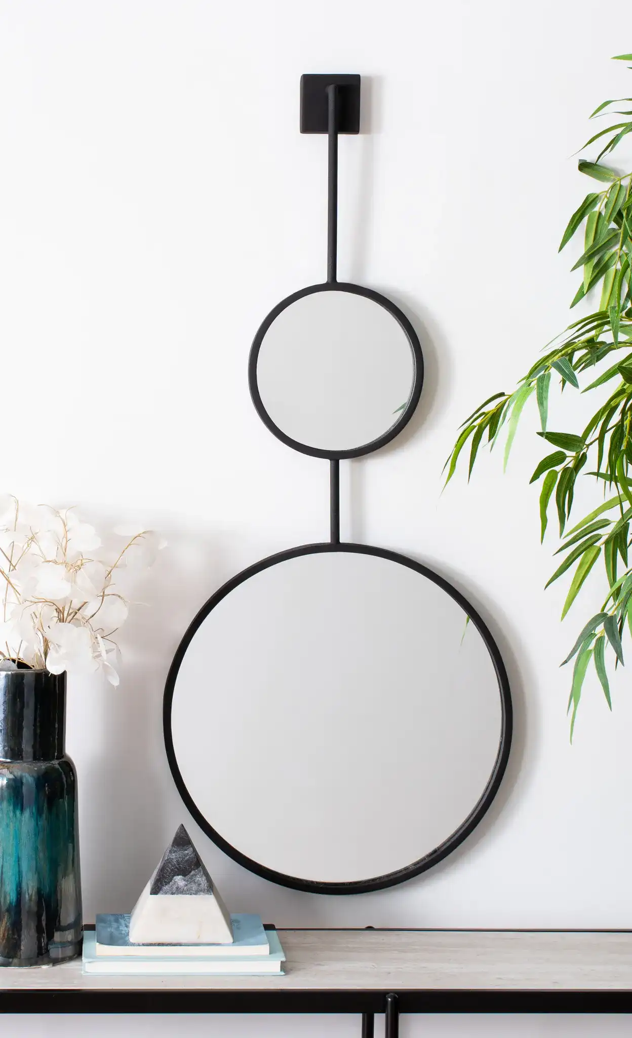 Jander Mirror in Matte Black in a styled room