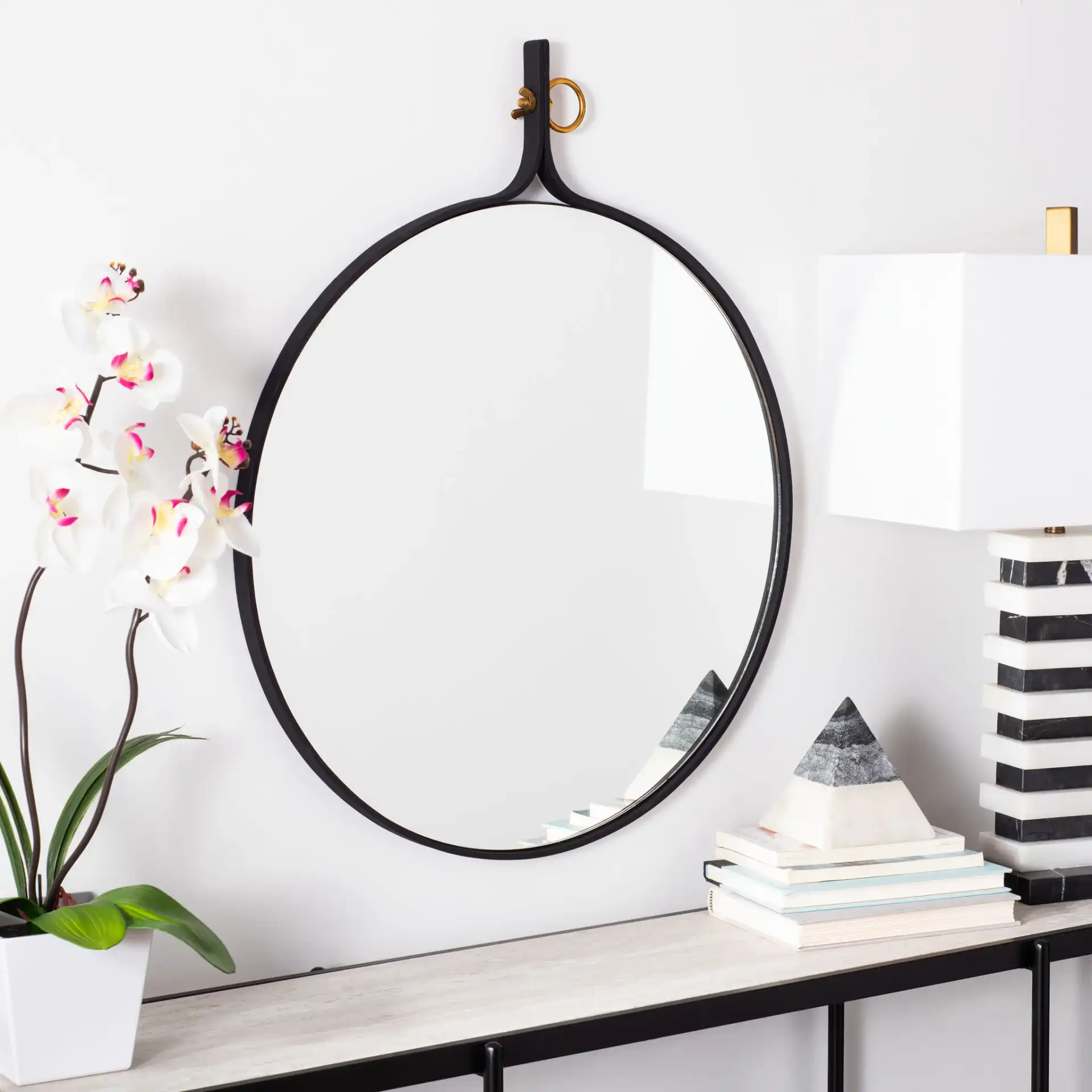 Chandlen Mirror in Matte Black in a styled room