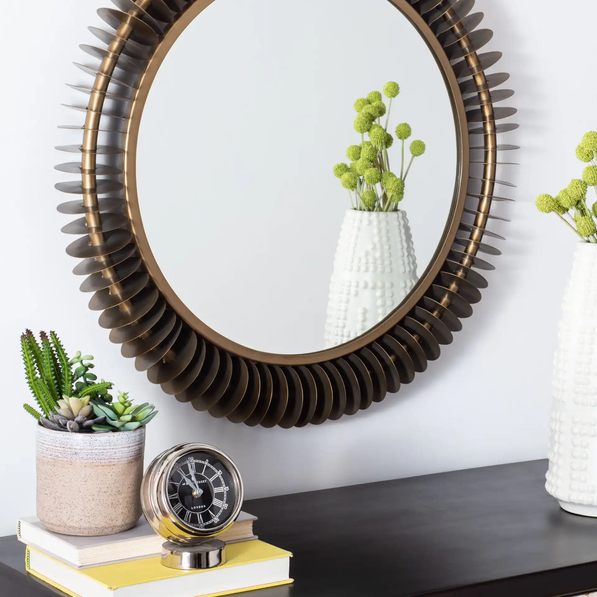Storm Mirror in Brass Antique in a styled room
