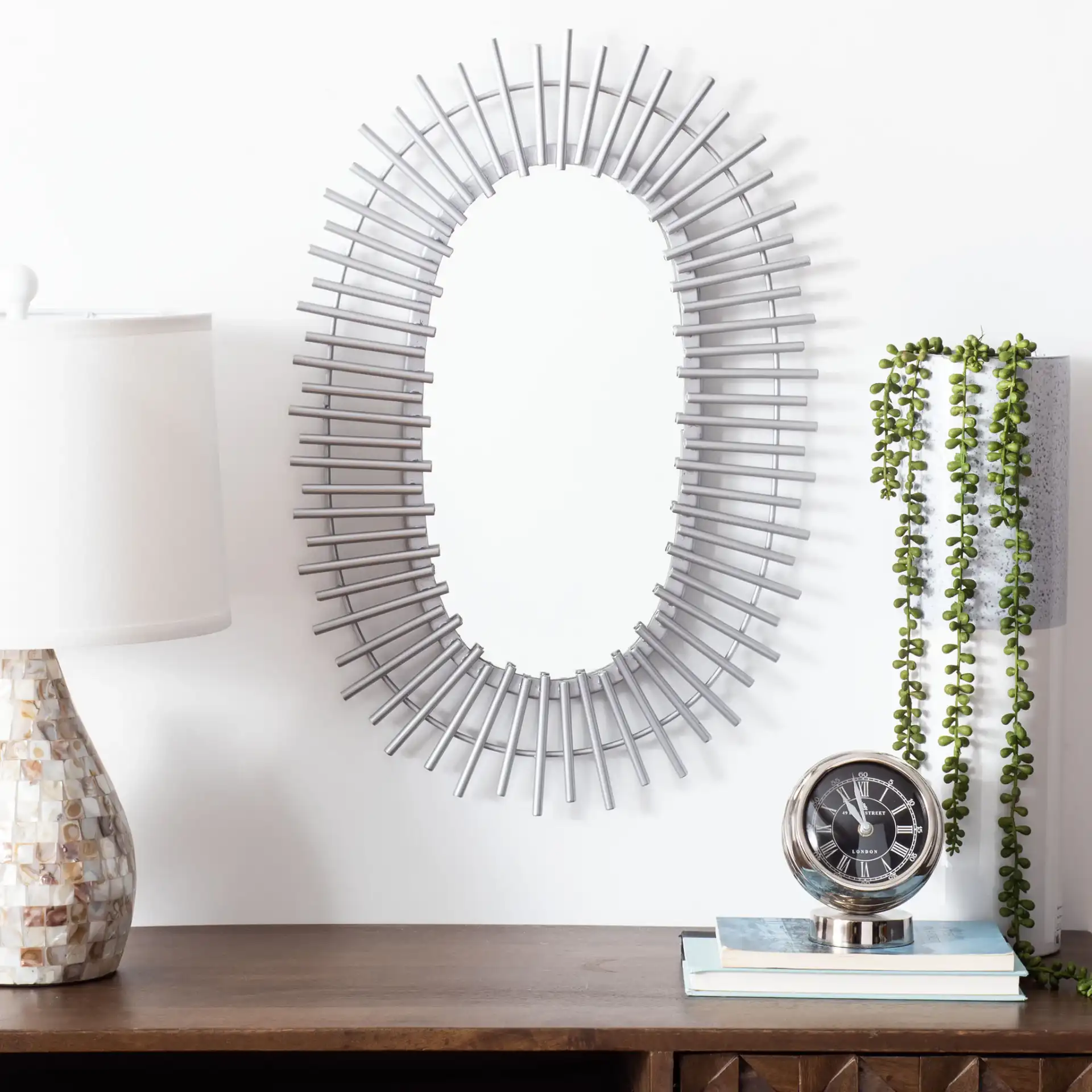 Valory Mirror in Silver in a styled room