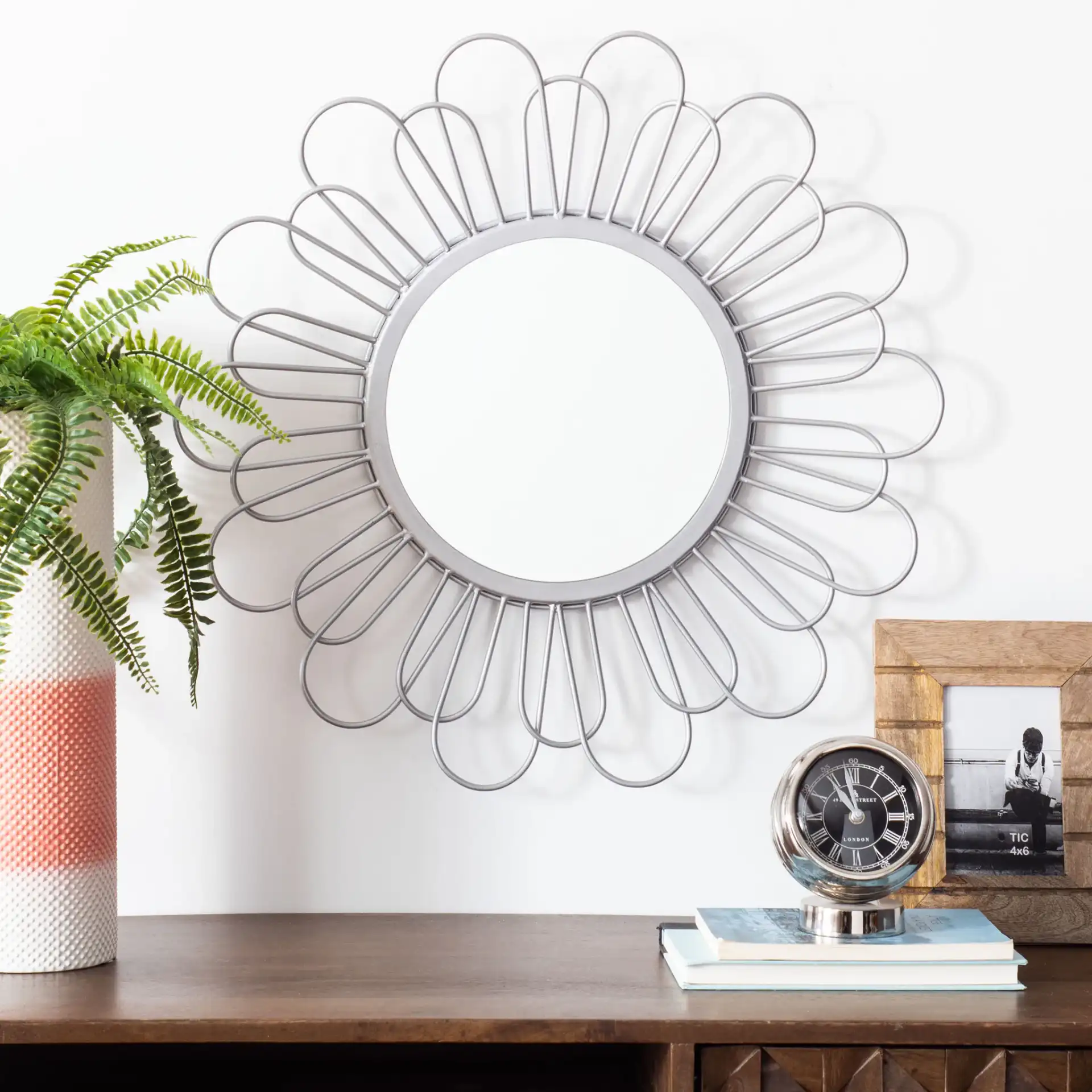 Lorence Mirror in Silver in a styled room