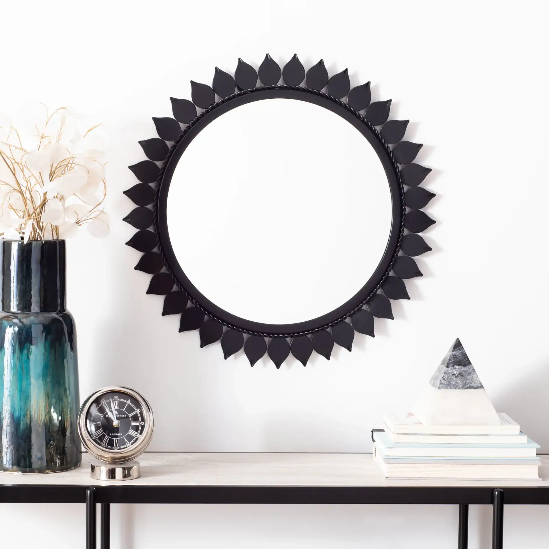 Nally Mirror in Matte Black in a styled room