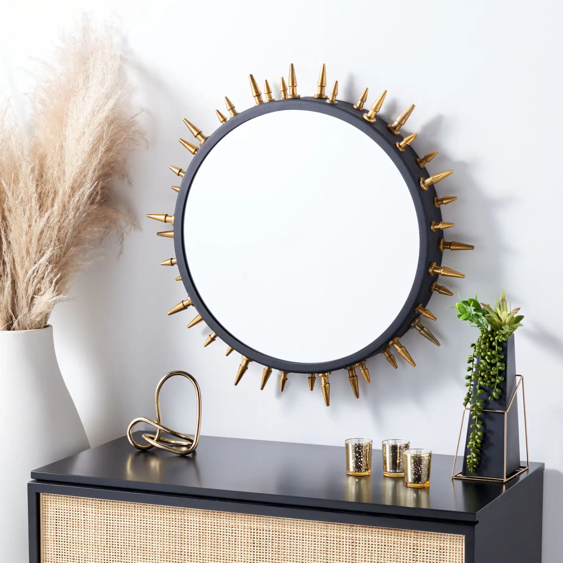 Ceinth Mirror in Black / Gold in a styled room