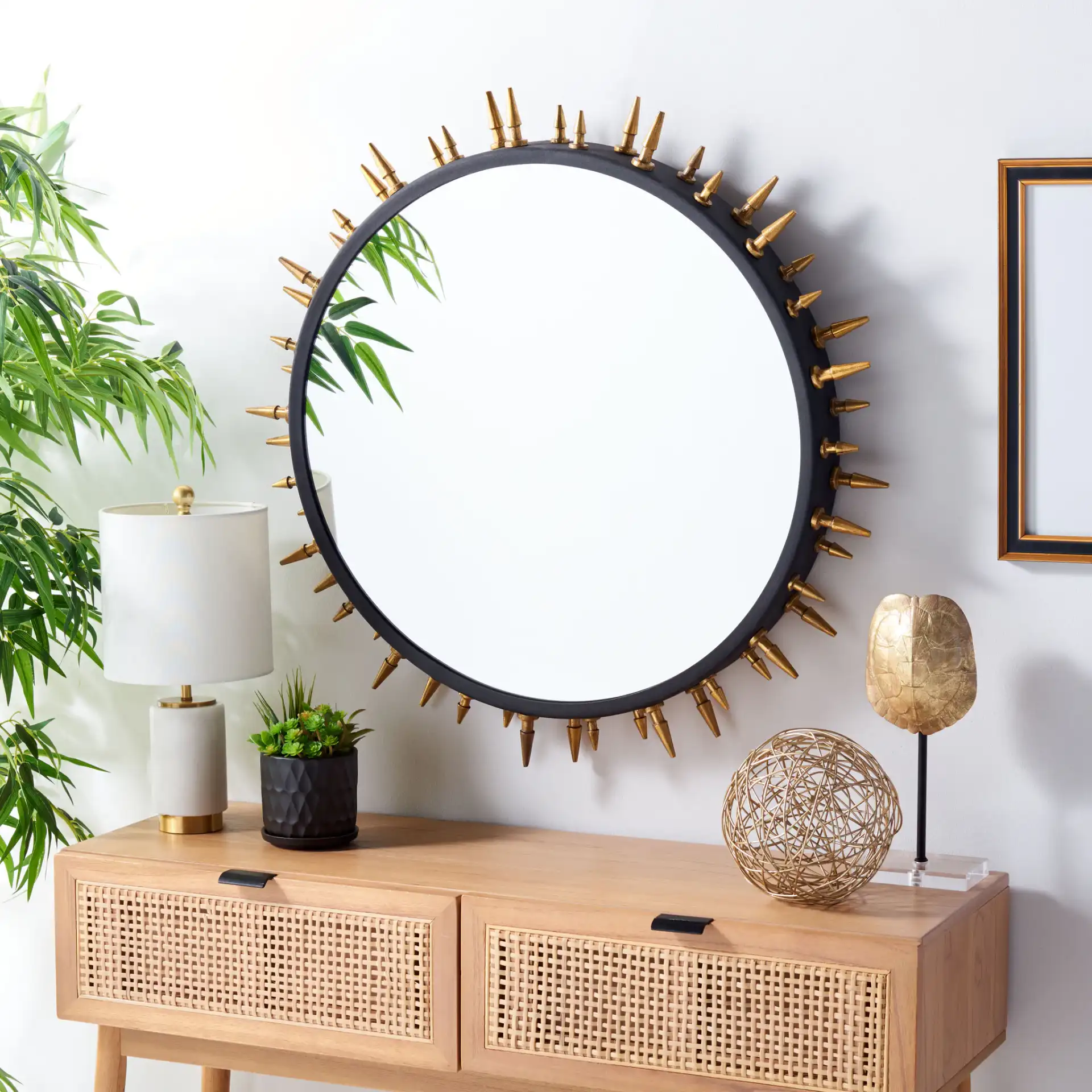 Ceinth 32-Inch Mirror in Black / Gold in a styled room