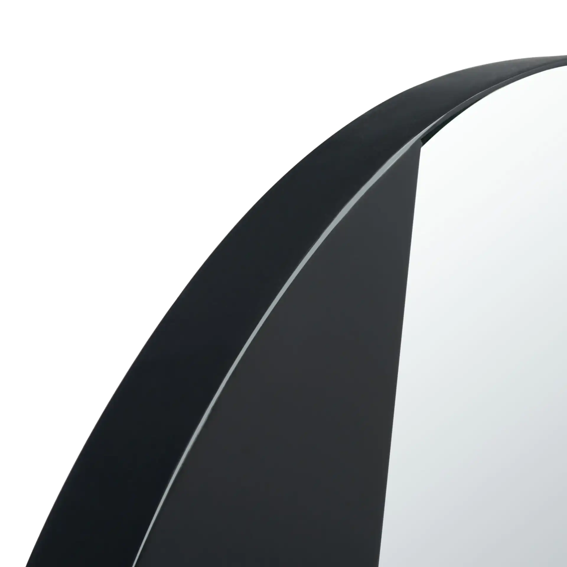 Dinas 28-Inch Mirror in Matte Black in a styled room
