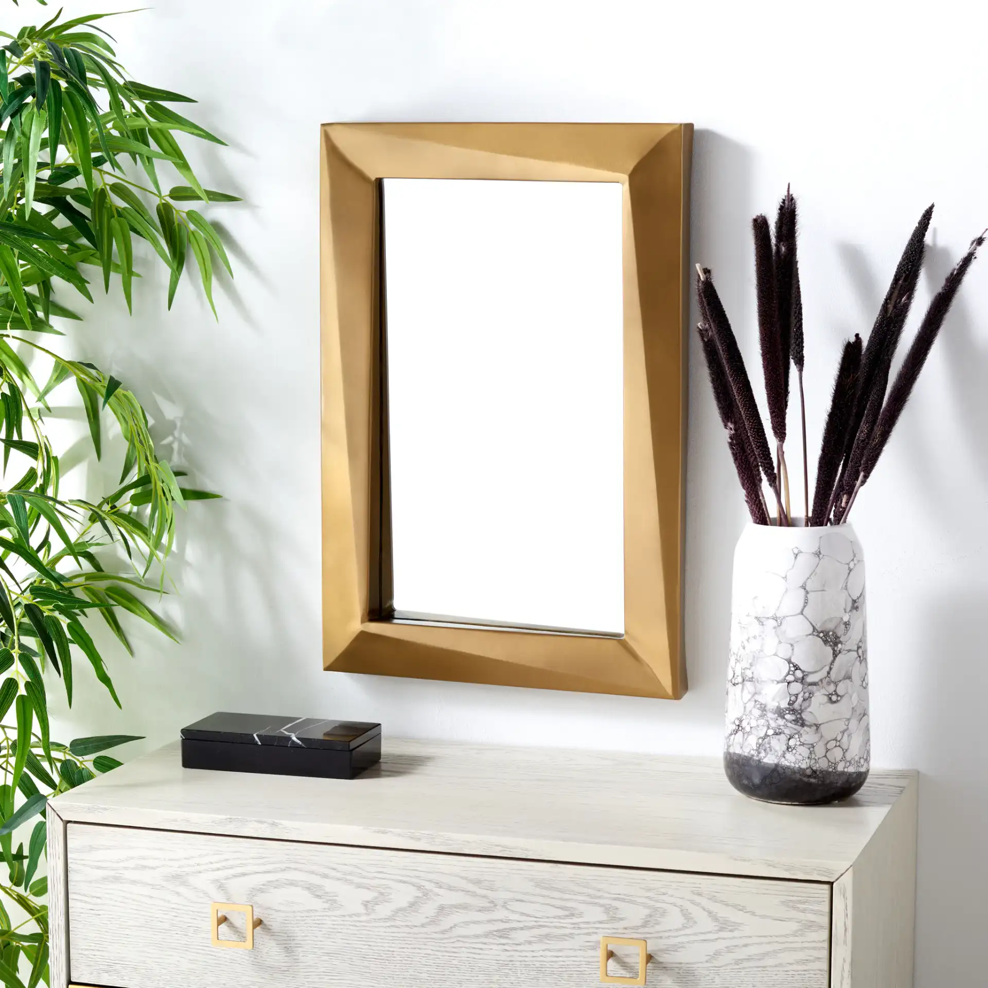 Ellarose 16" Mirror in Antique Brass in a styled room
