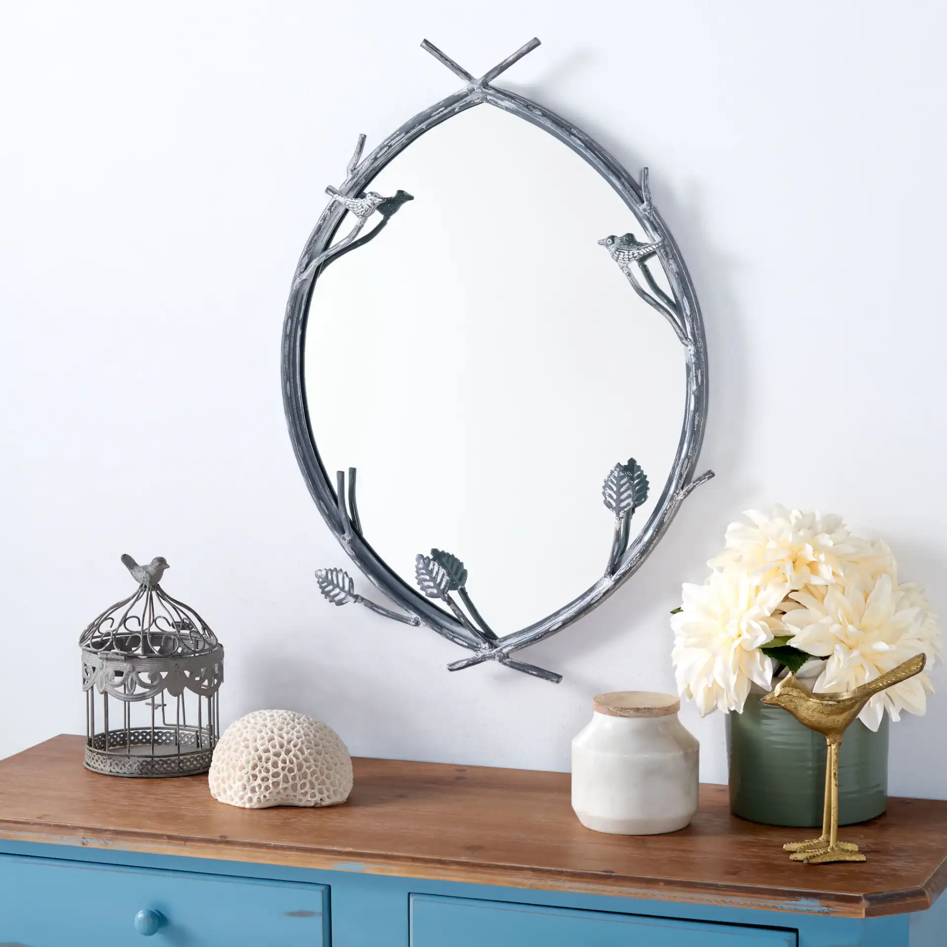Helios 18.75-Inch Mirror in Silver in a styled room
