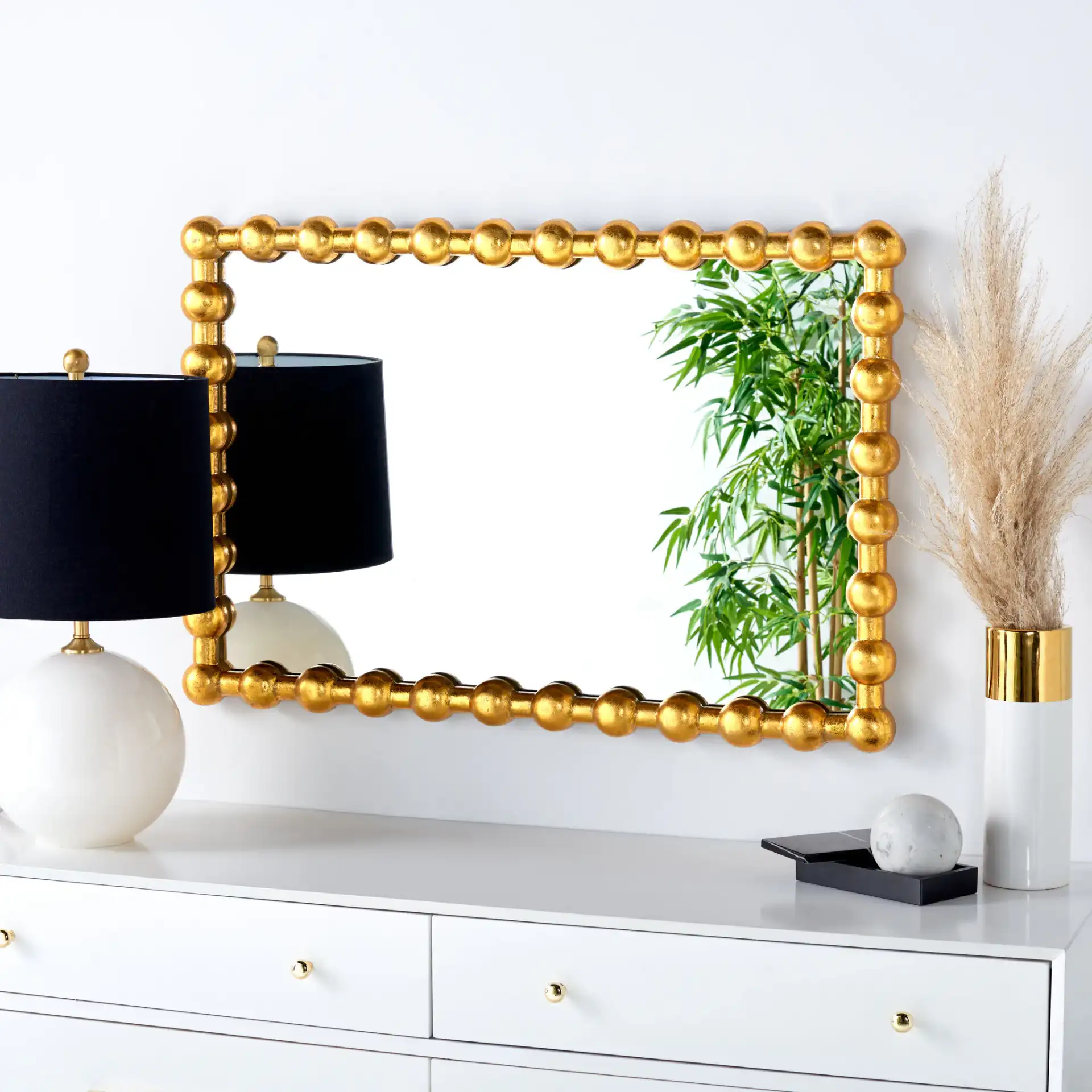 Rynne 25-Inch Mirror in Gold Foil in a styled room