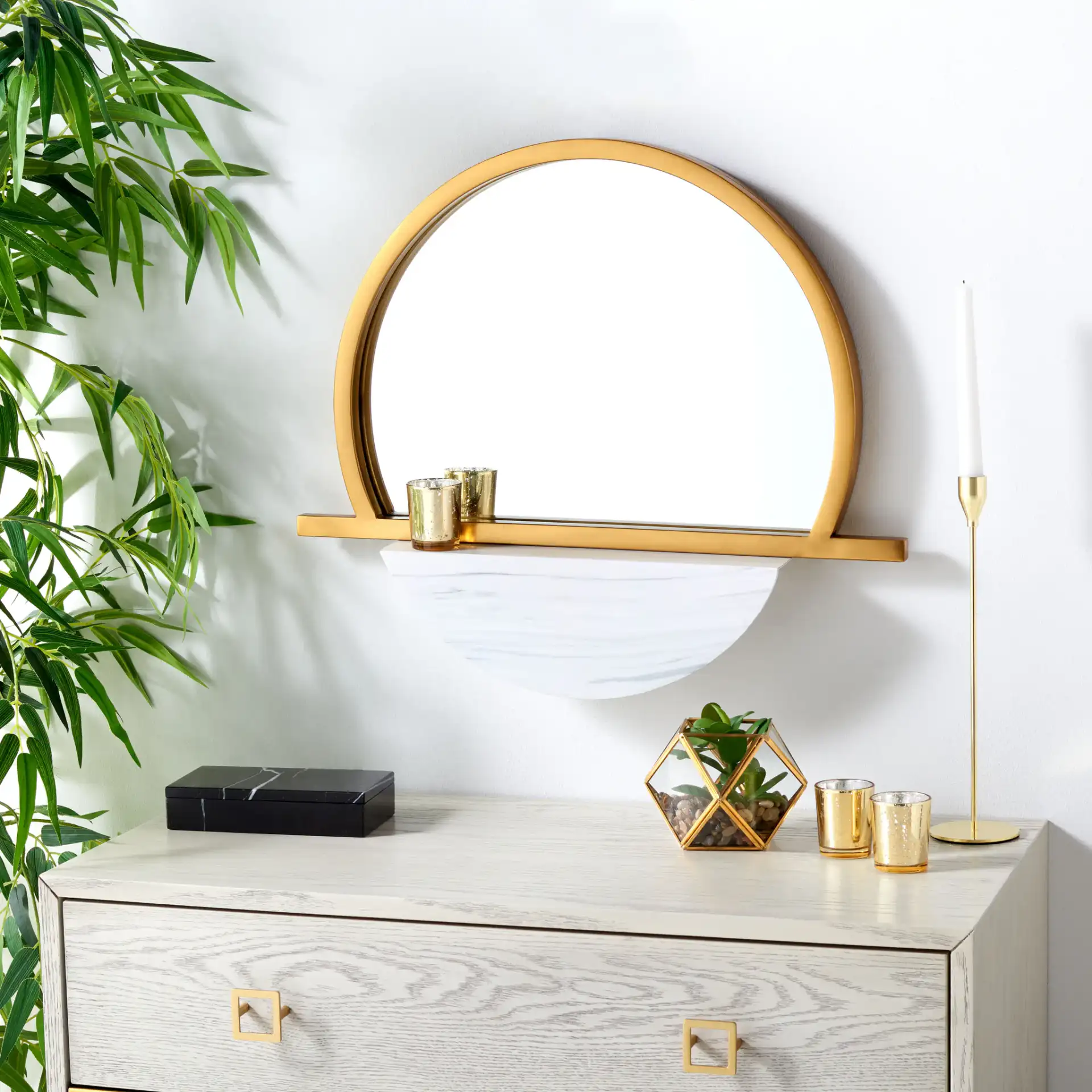 Sarada Mirror in Gold / White in a styled room
