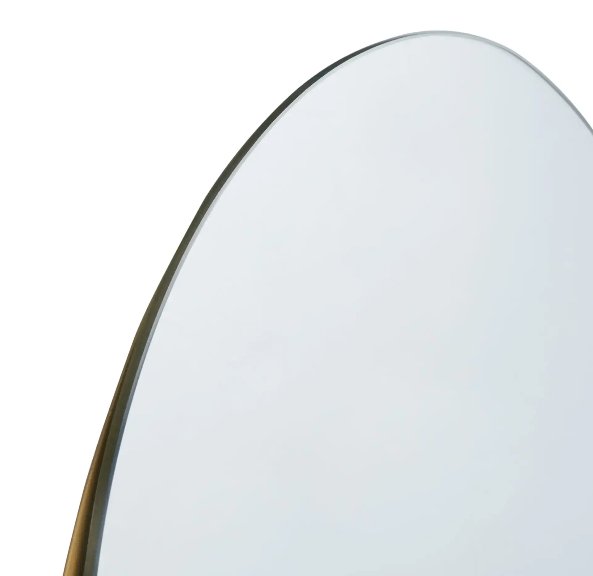 Norbury 18-Inch Mirror in Brass / Black in a styled room