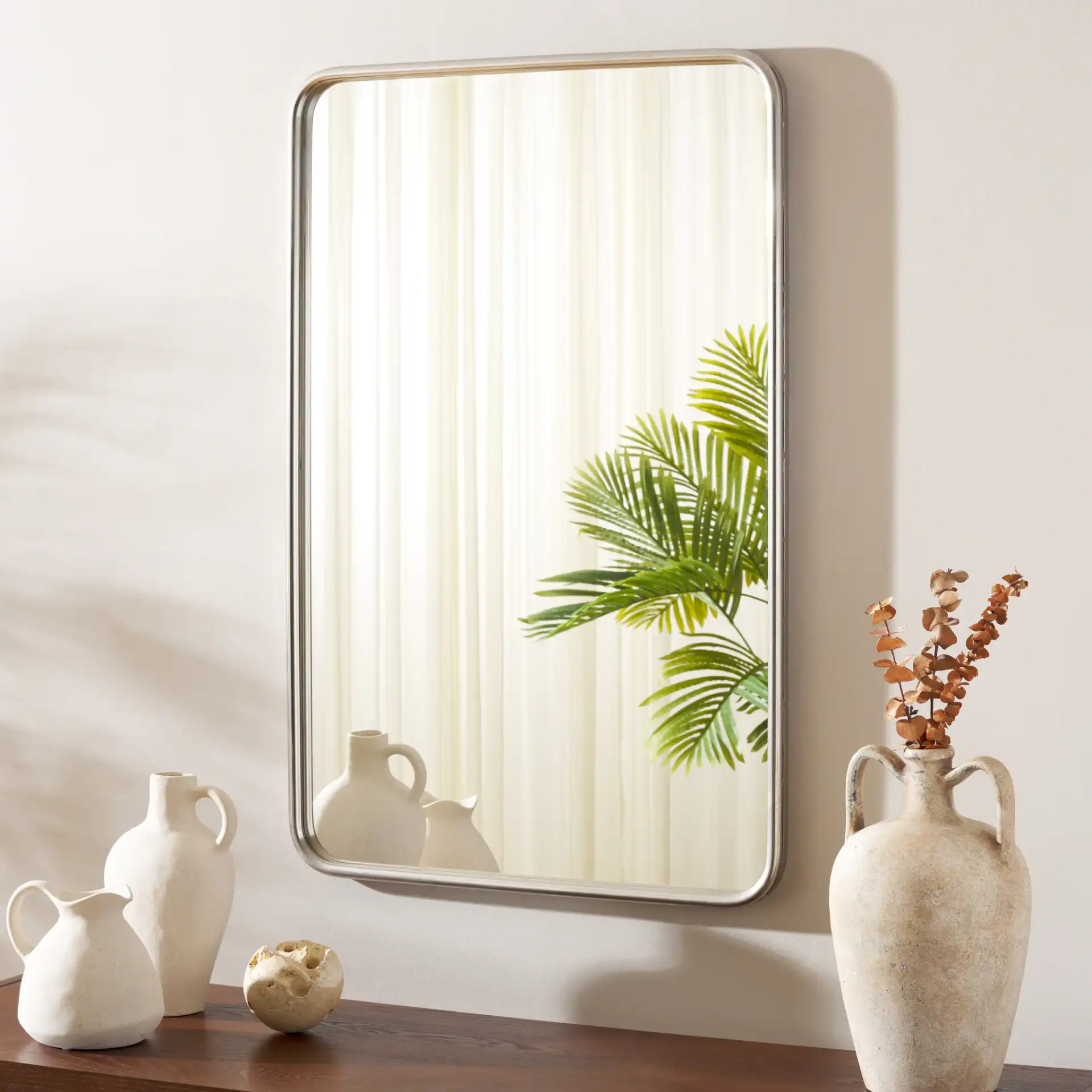 Base 24-Inch Mirror in Chrome in a styled room