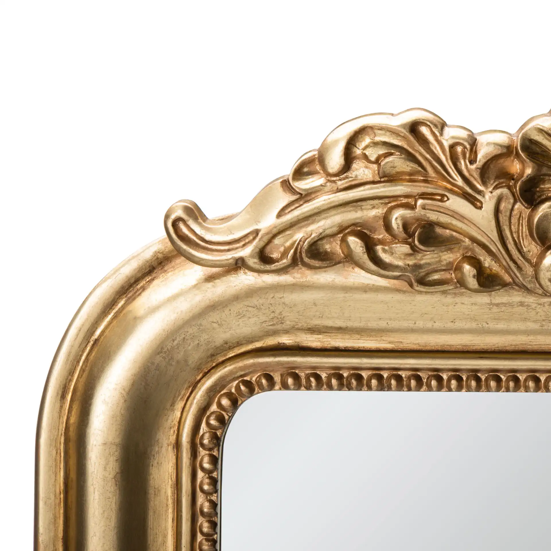 Wenda Mirror in Antique Gold in a styled room