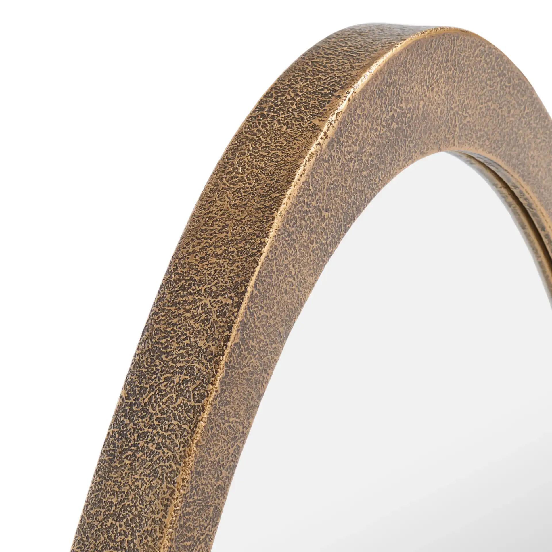 Cassini Mirror in Brass in a styled room