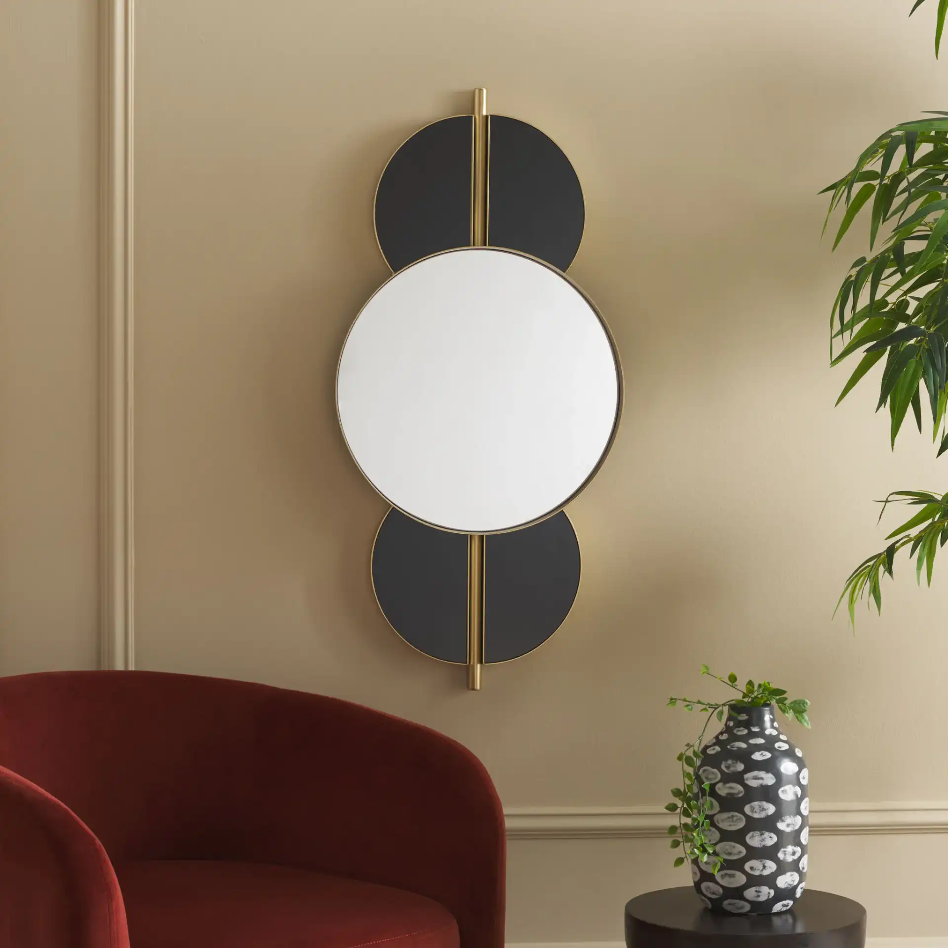 Syrus 16.5-Inch Mirror in Gold / Black in a styled room