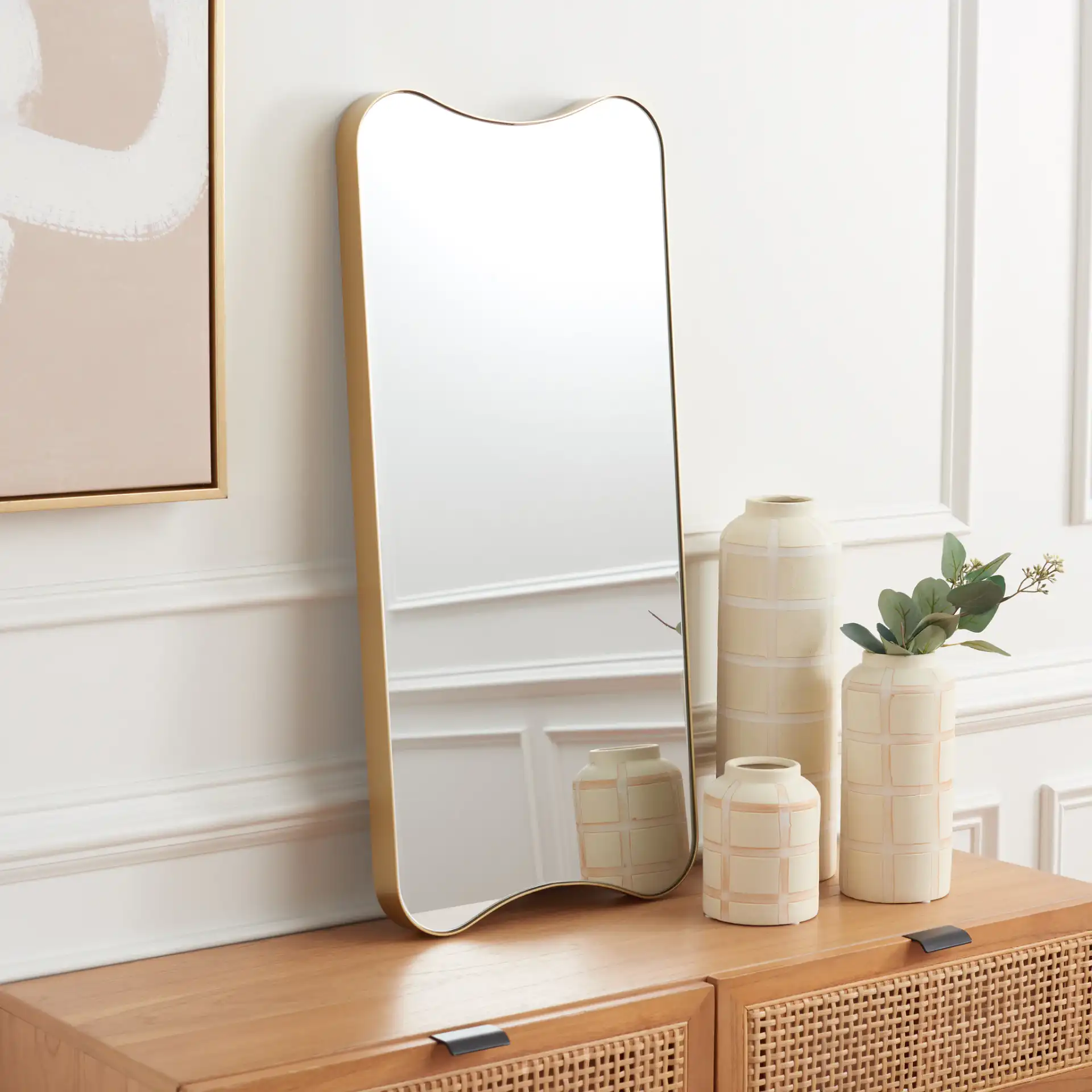 Hyla 14" Mirror in Gold in a styled room