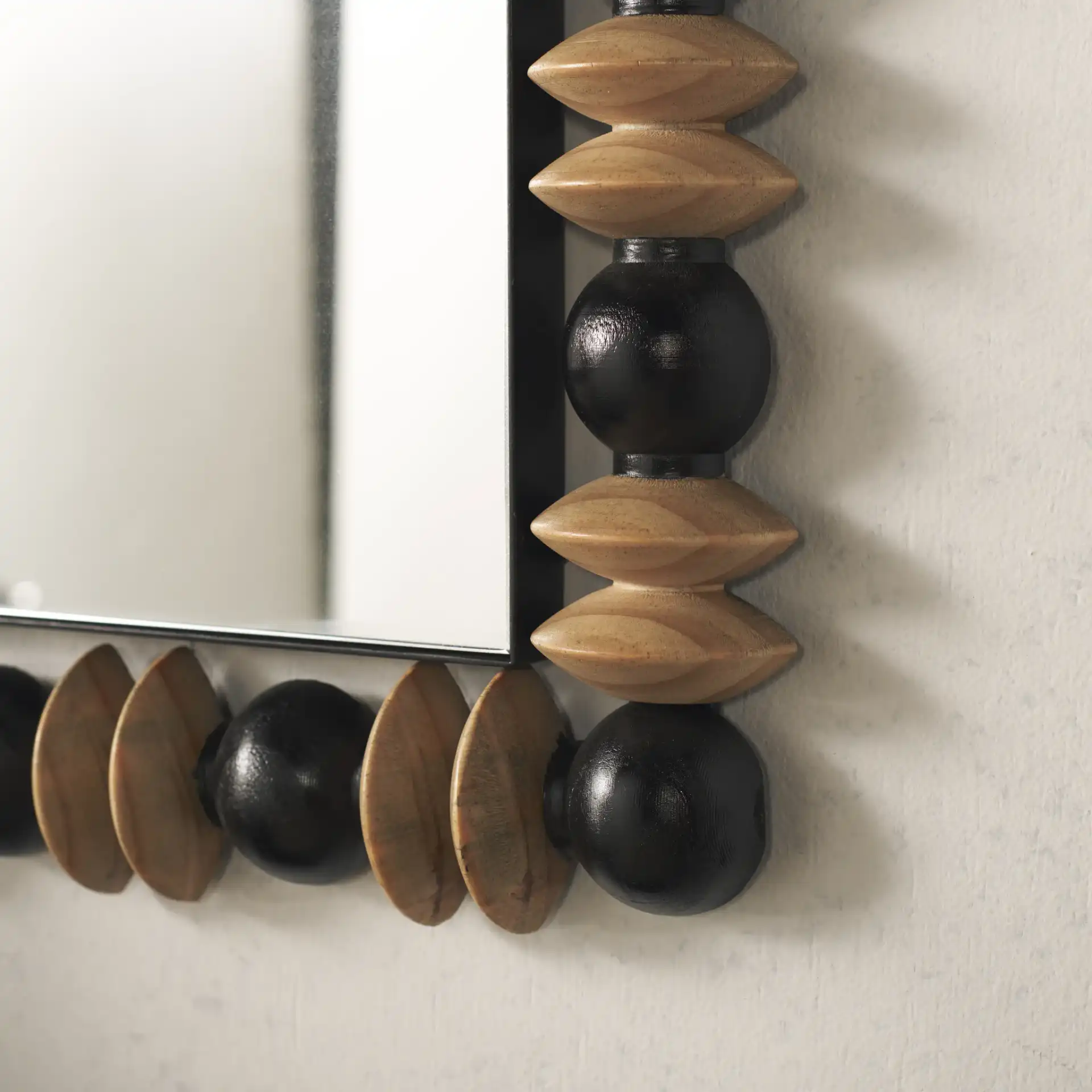 Azaria 24.6-Inch Mirror in Black / Natural in a styled room