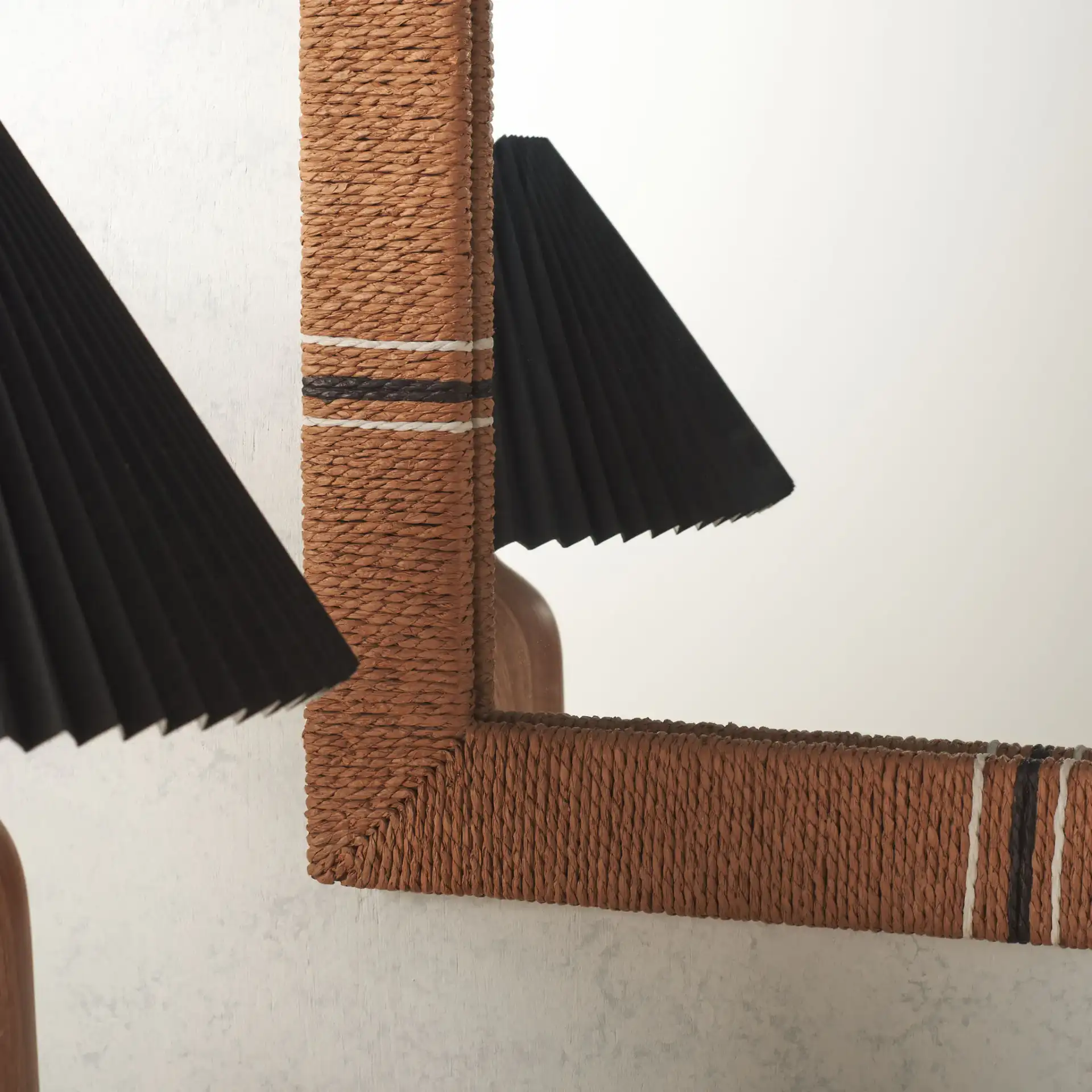 Sarla Mirror in Natural in a styled room