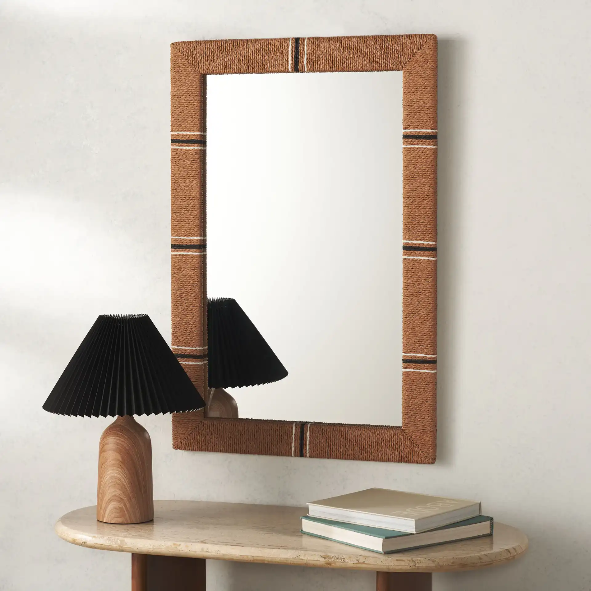 Sarla Mirror in Natural in a styled room