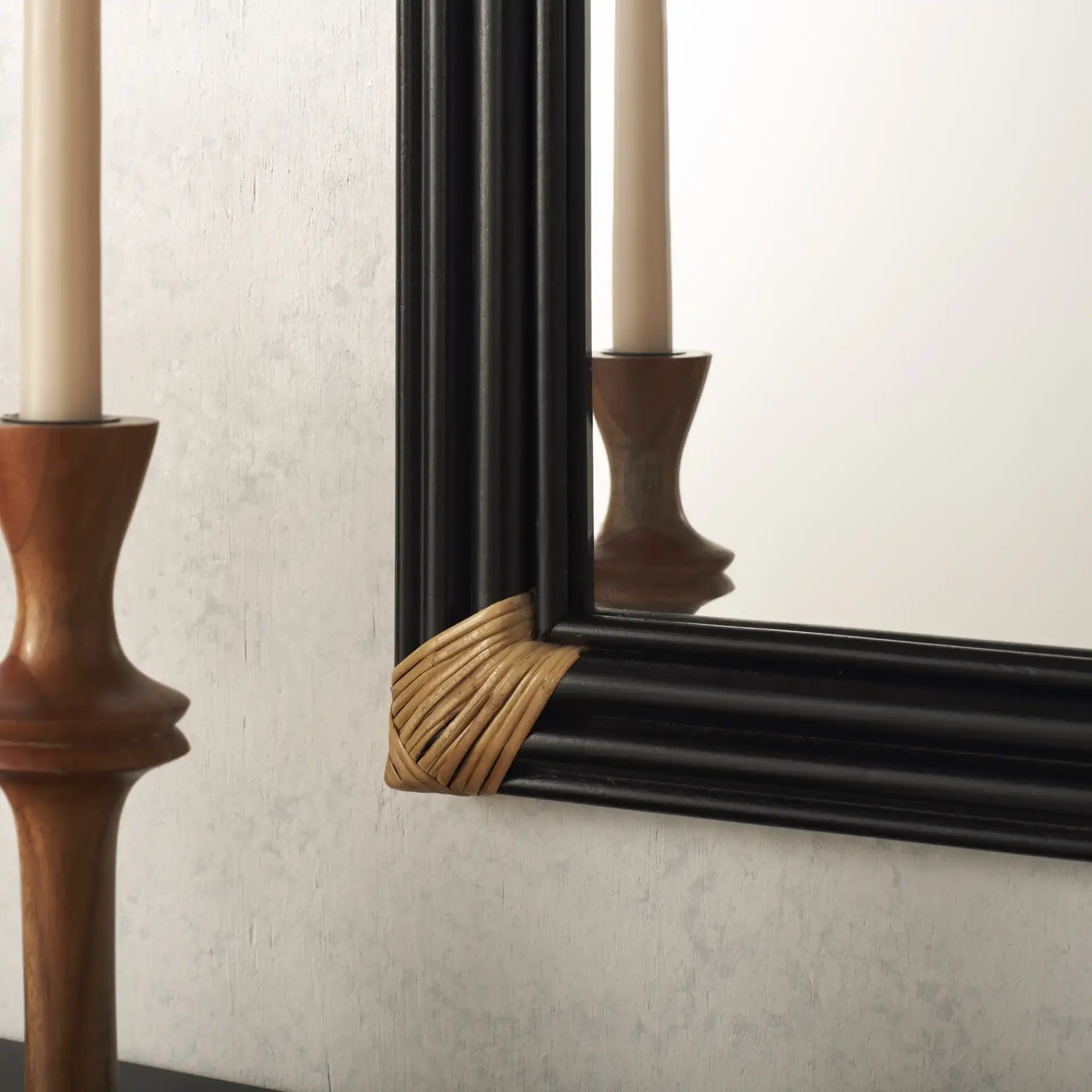 Bindie 24-Inch Mirror in Natural / Black in a styled room