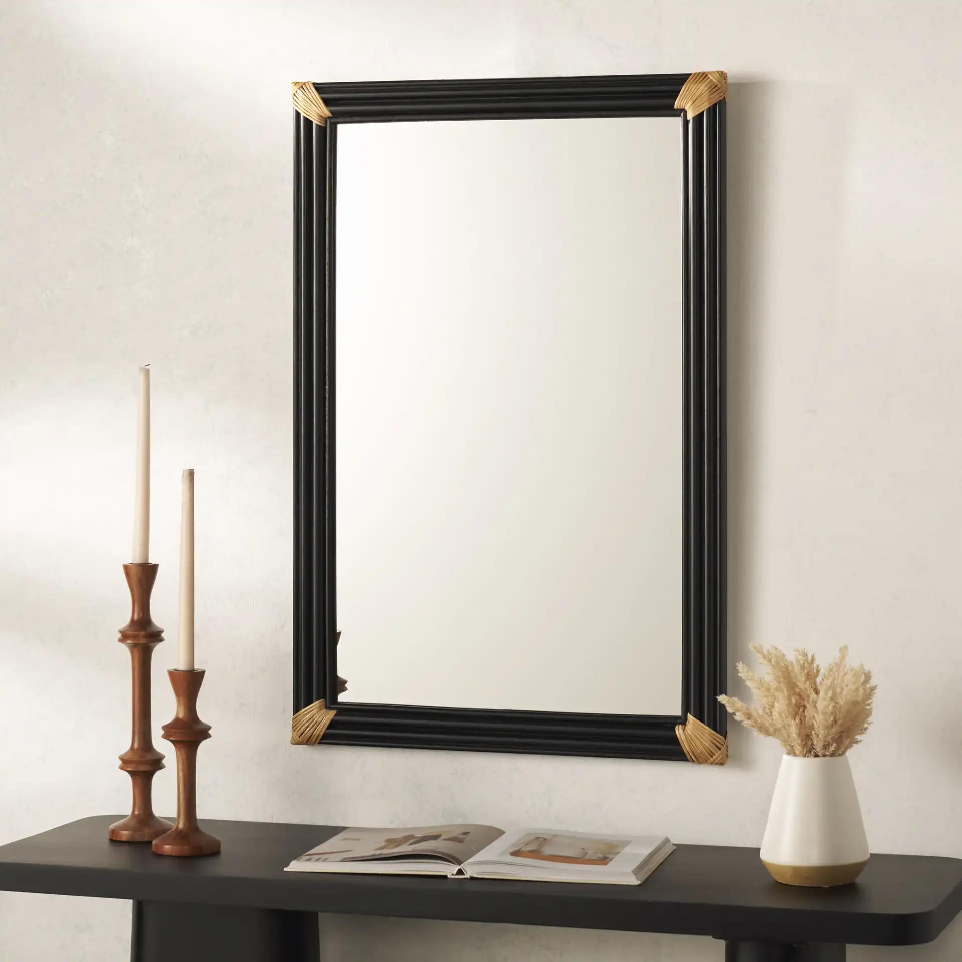 Bindie 24-Inch Mirror in Natural / Black in a styled room