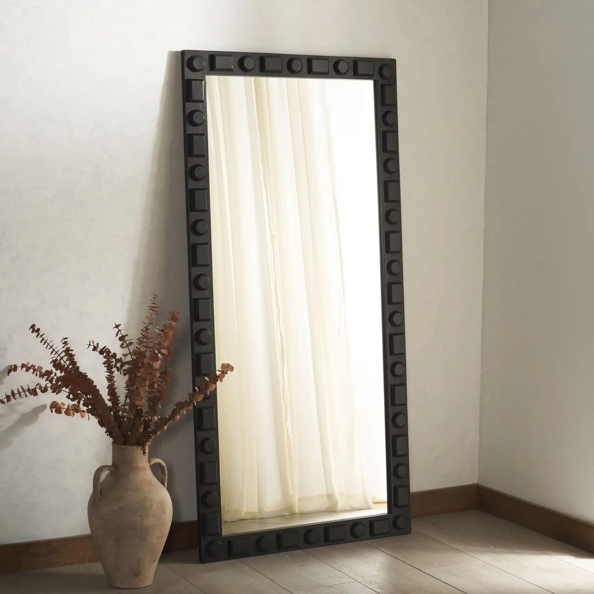 Odette 31-Inch Mirror in Black in a styled room