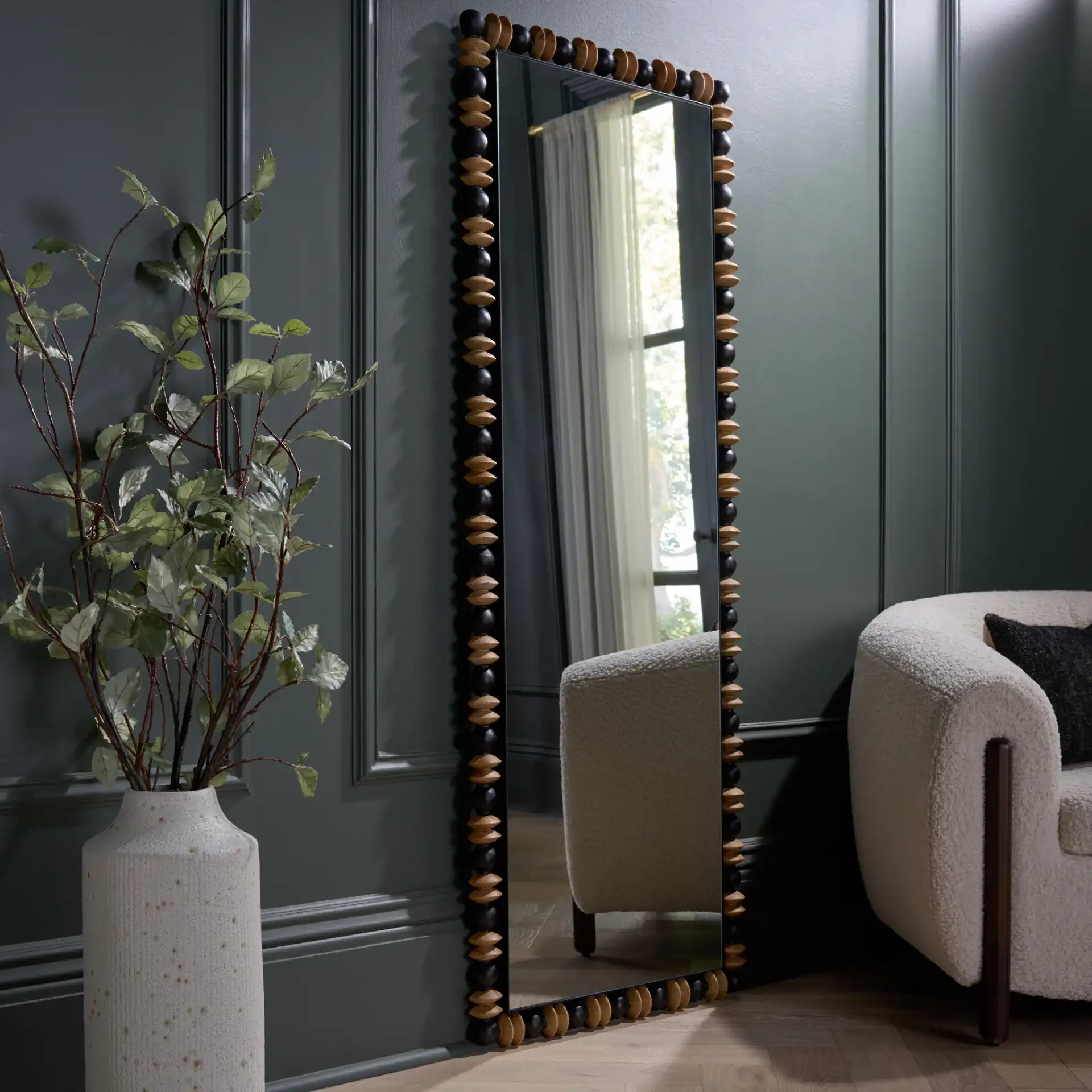 Azaria Full Length Mirror in Black / Natural in a styled room