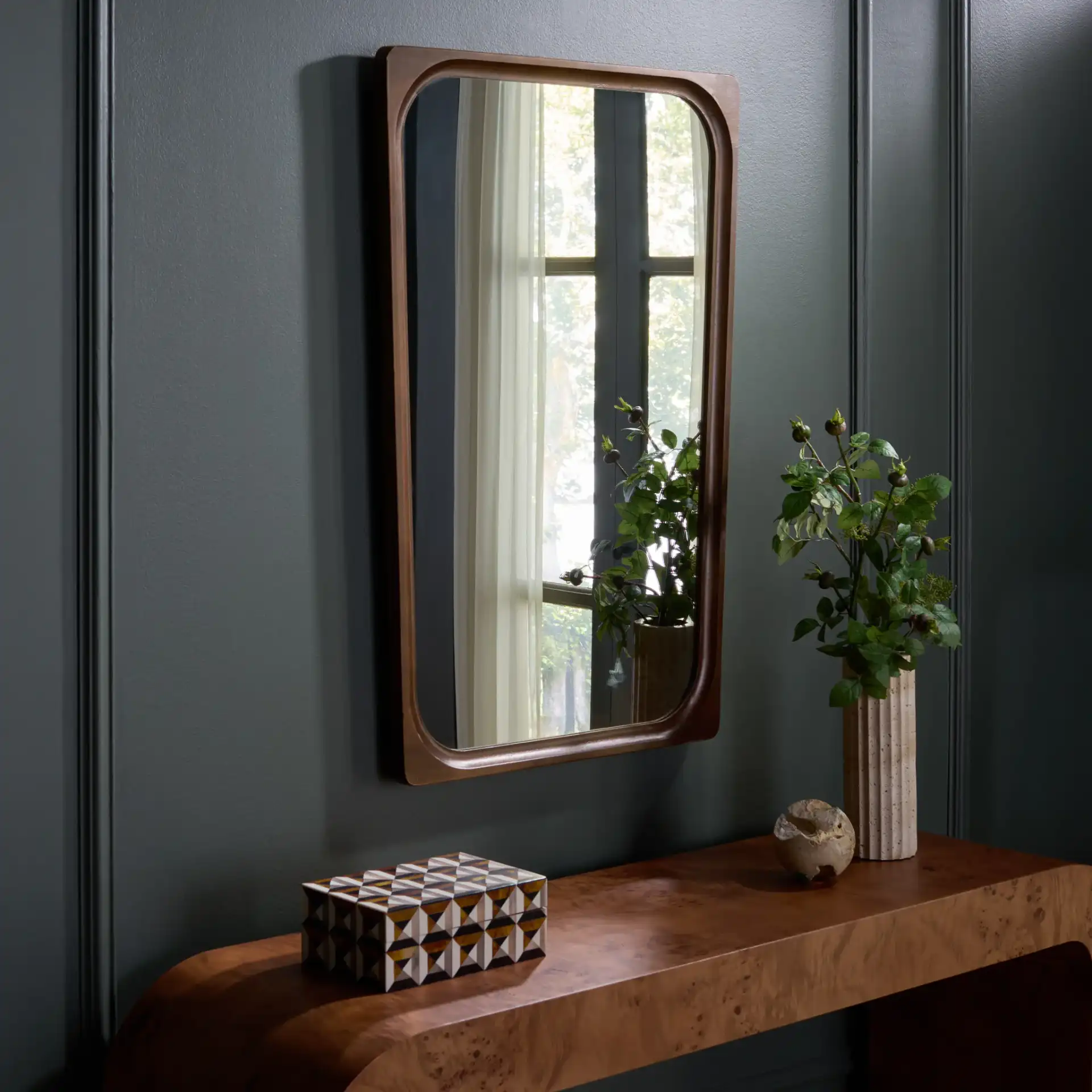 Lola Wall Mirror in Brown in a styled room
