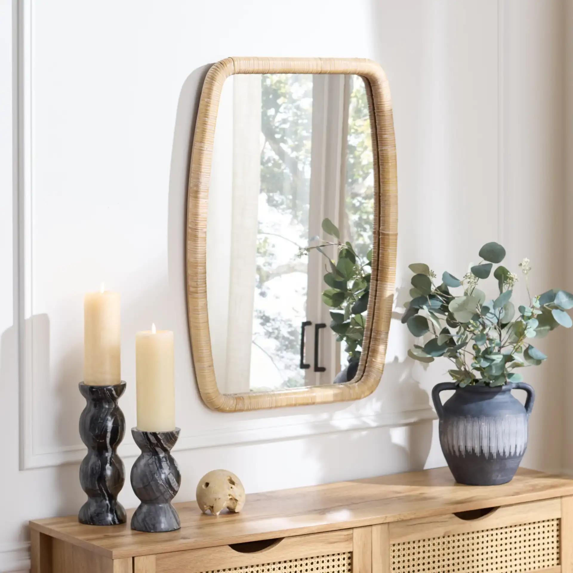 Lani Wall Mirror in Natural in a styled room