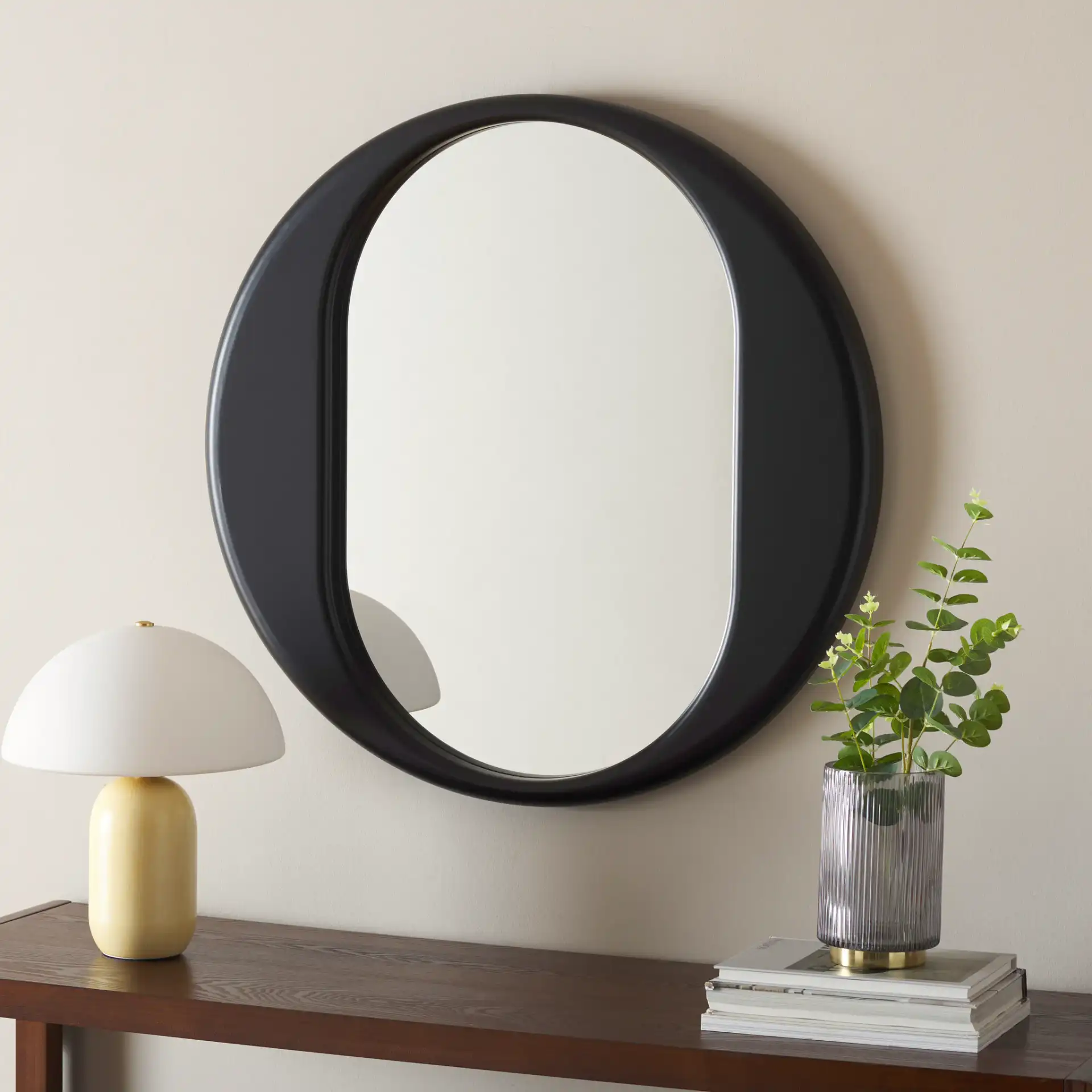 Ollie Wall Mirror in Black in a styled room