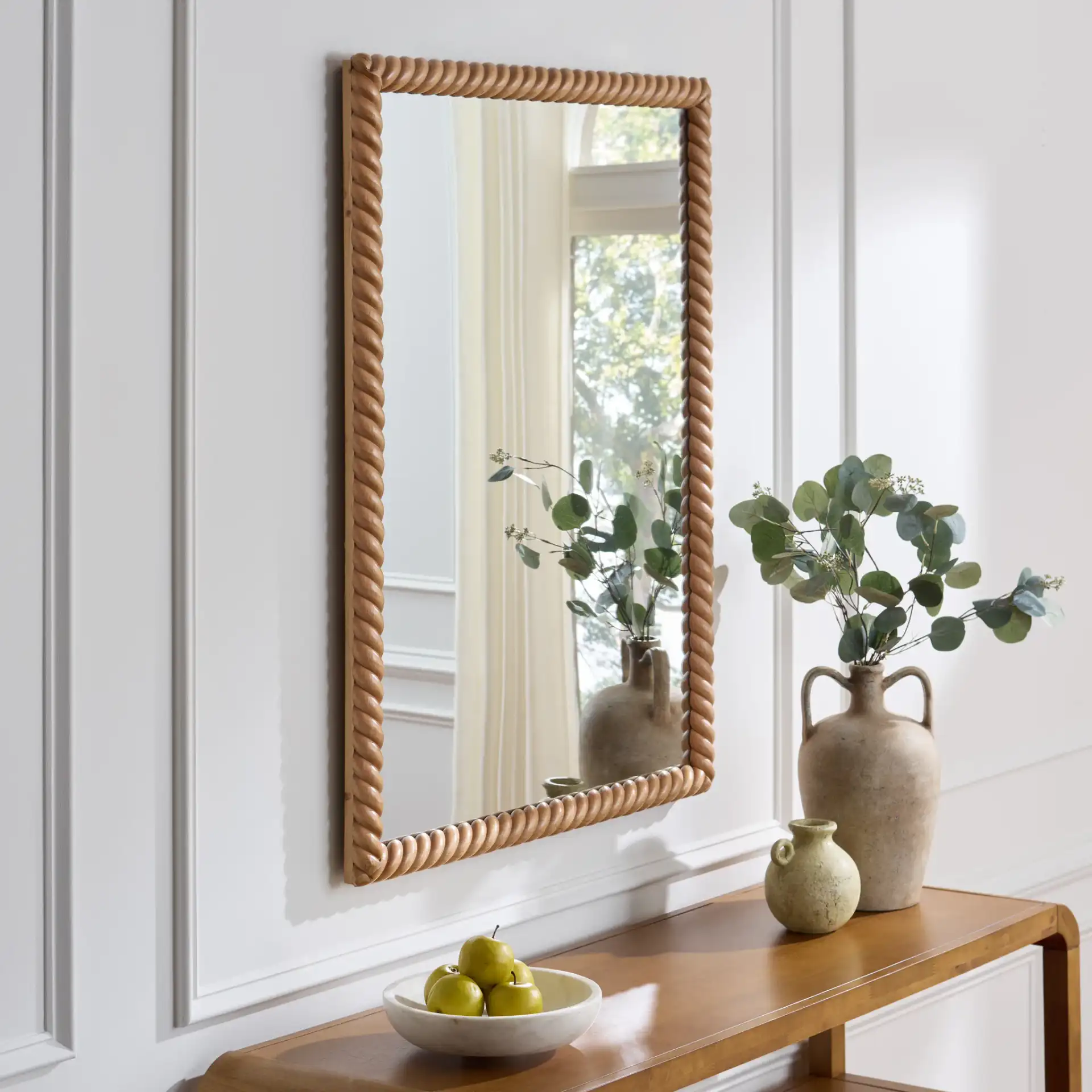 Kenz Braided Wall Mirror in Brown in a styled room