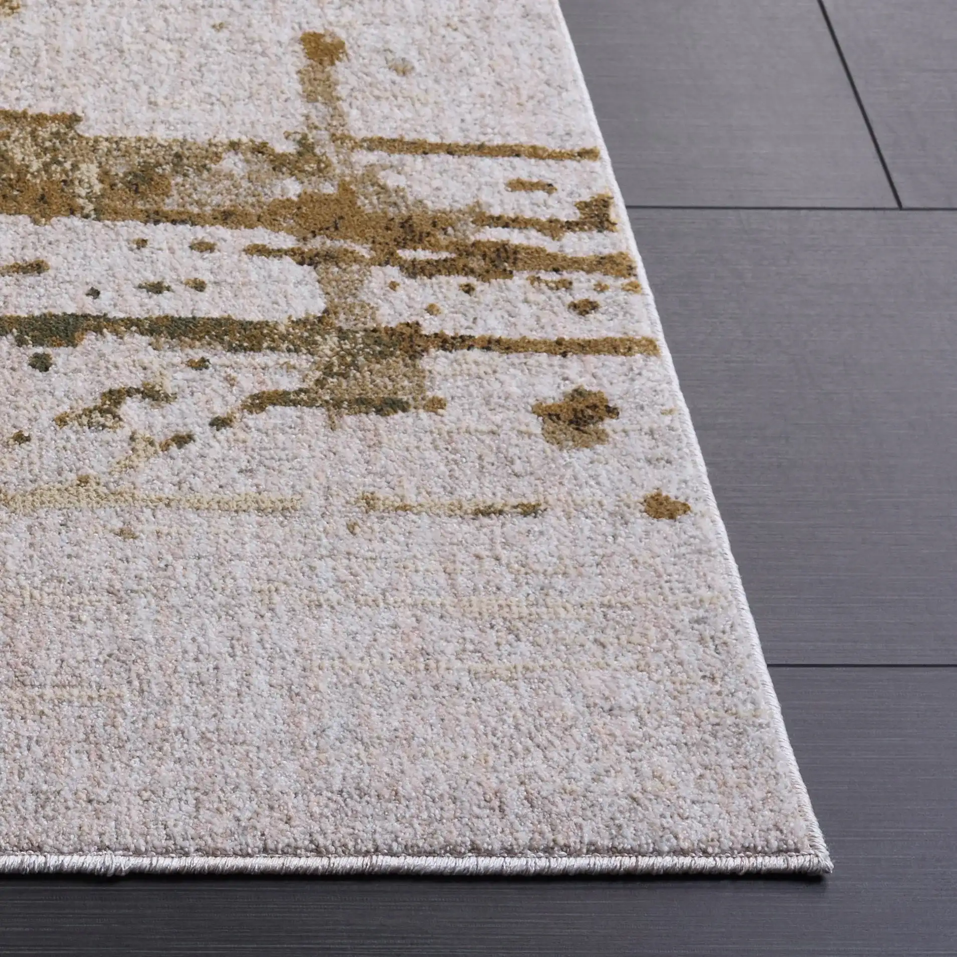 Marvel Splatter Abstract Rug in Gray / Beige in a styled room