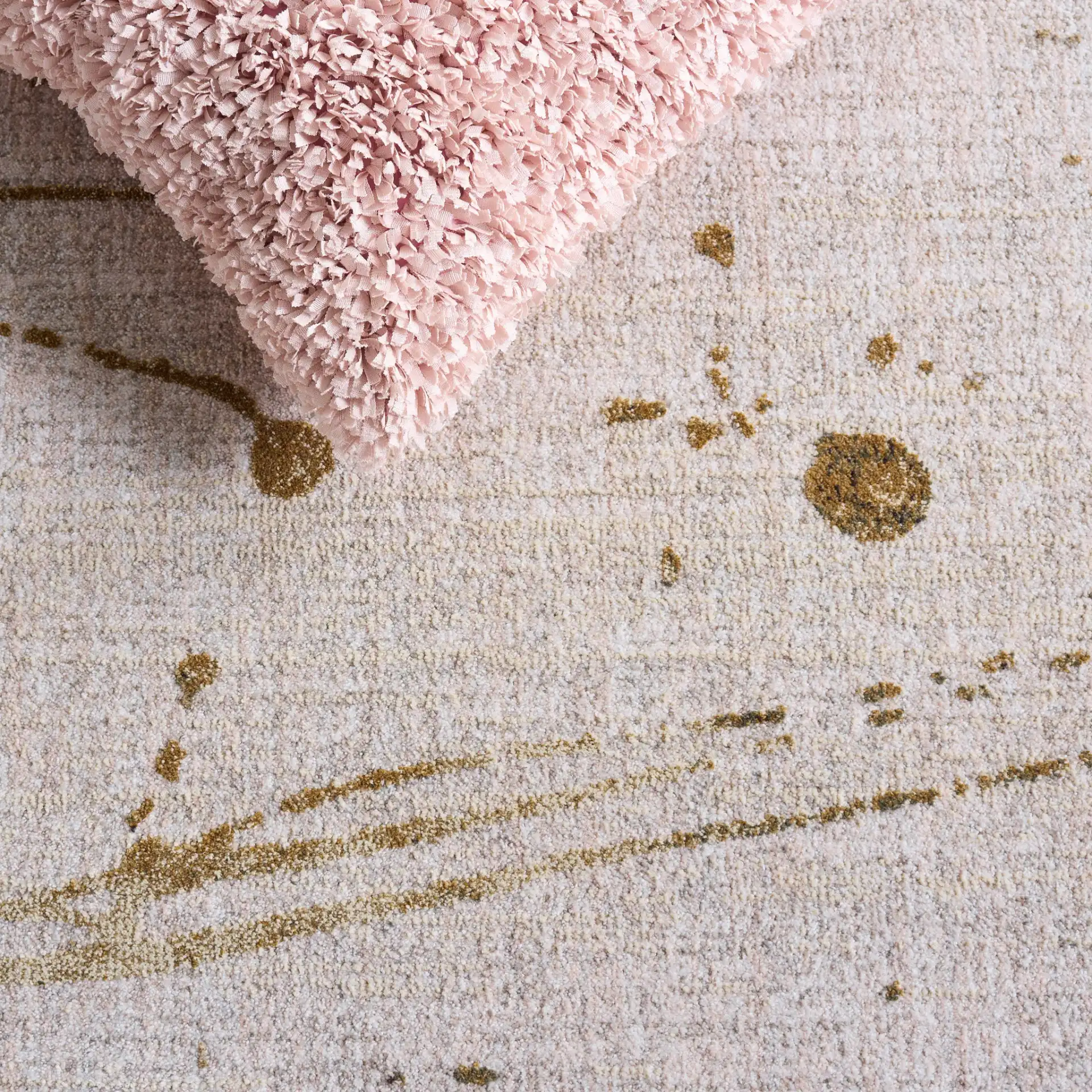 Marvel Splatter Abstract Rug in Gray / Beige in a styled room