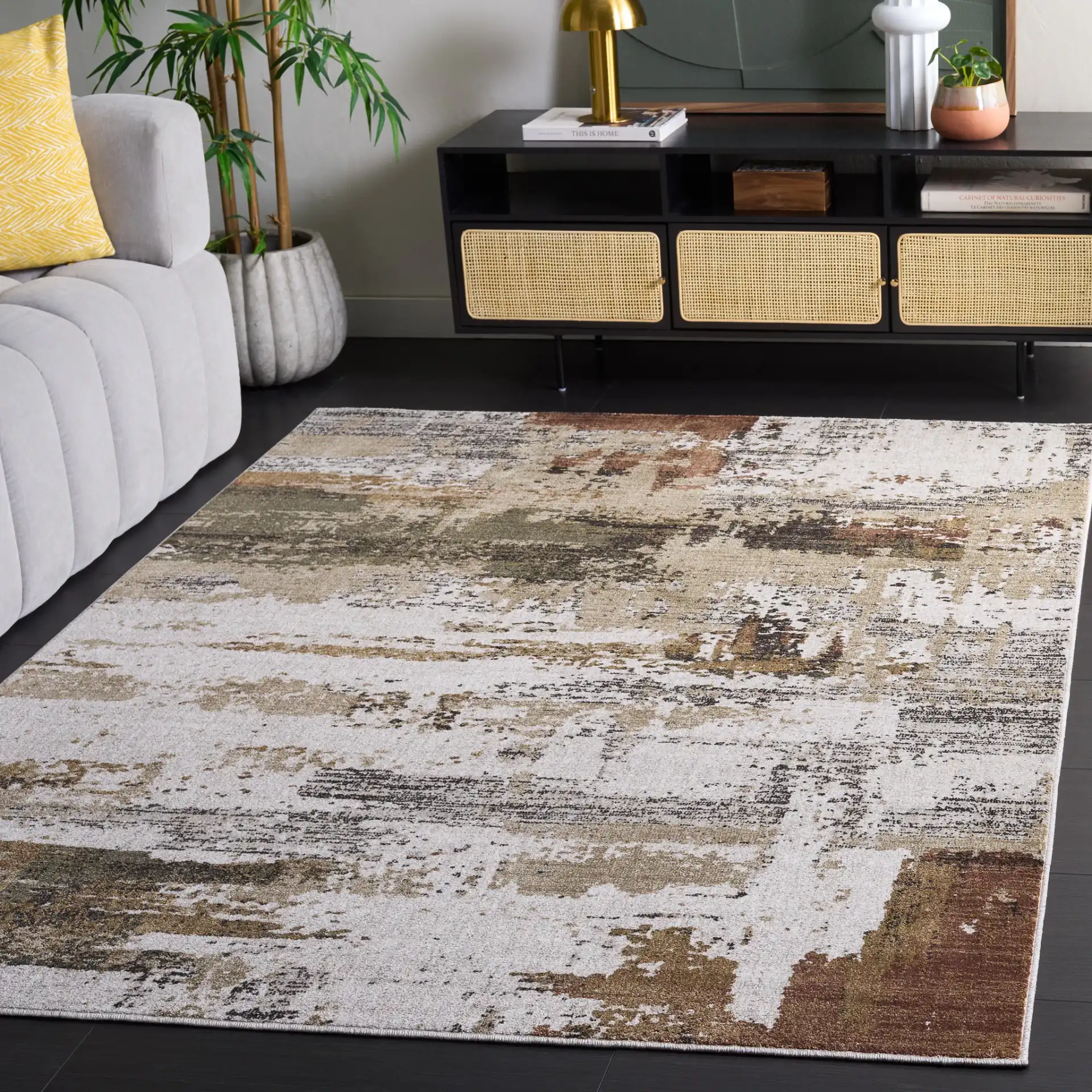 Marvel Abstract Brushstroke Rug in Dark Beige / Dark Gray in a styled room