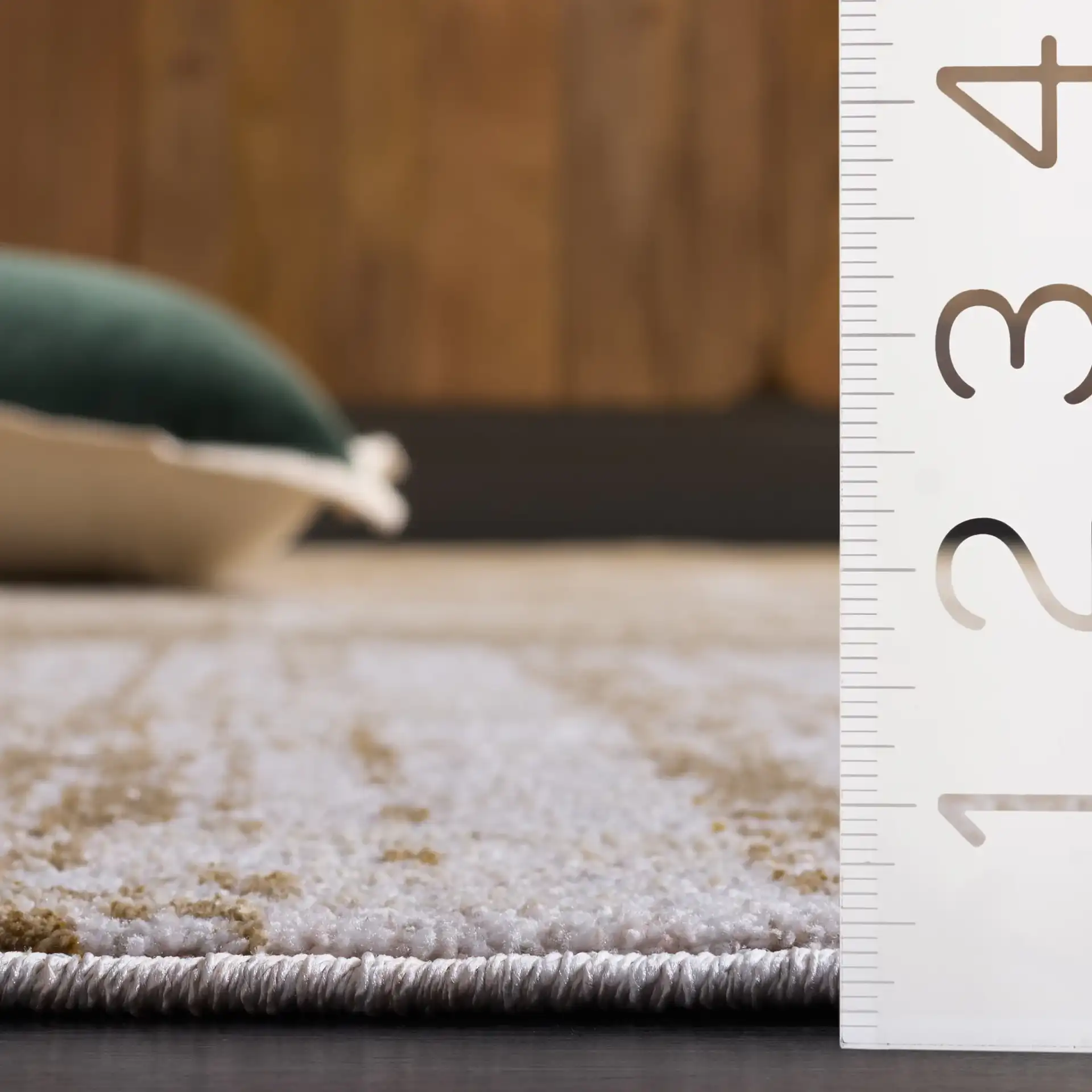 Marvel Banded Circle Rug in Beige / Gray in a styled room
