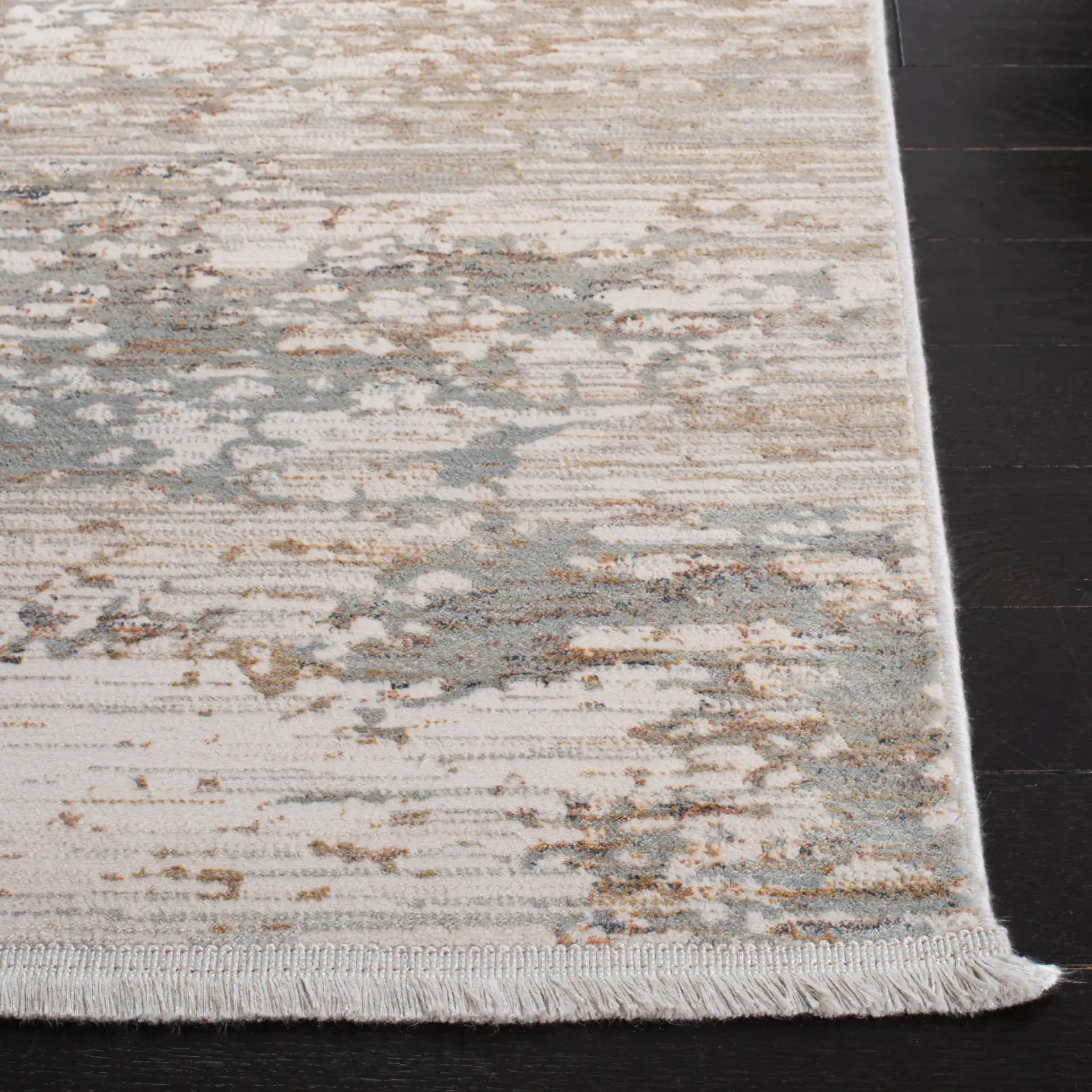 Marvel Striated Abstract Rug in Beige / Gold in a styled room