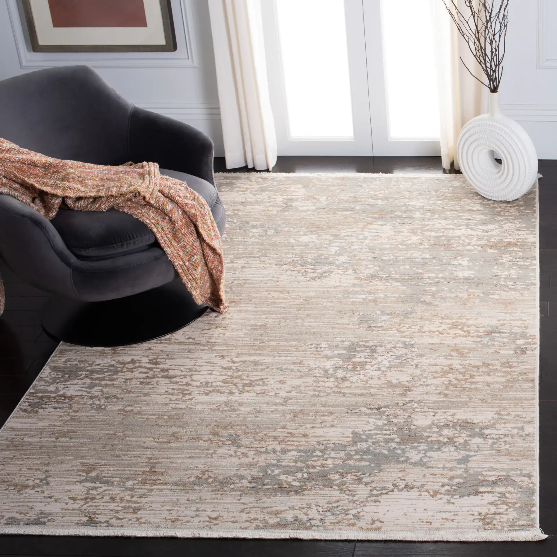 Marvel Striated Abstract Rug in Beige / Gold in a styled room