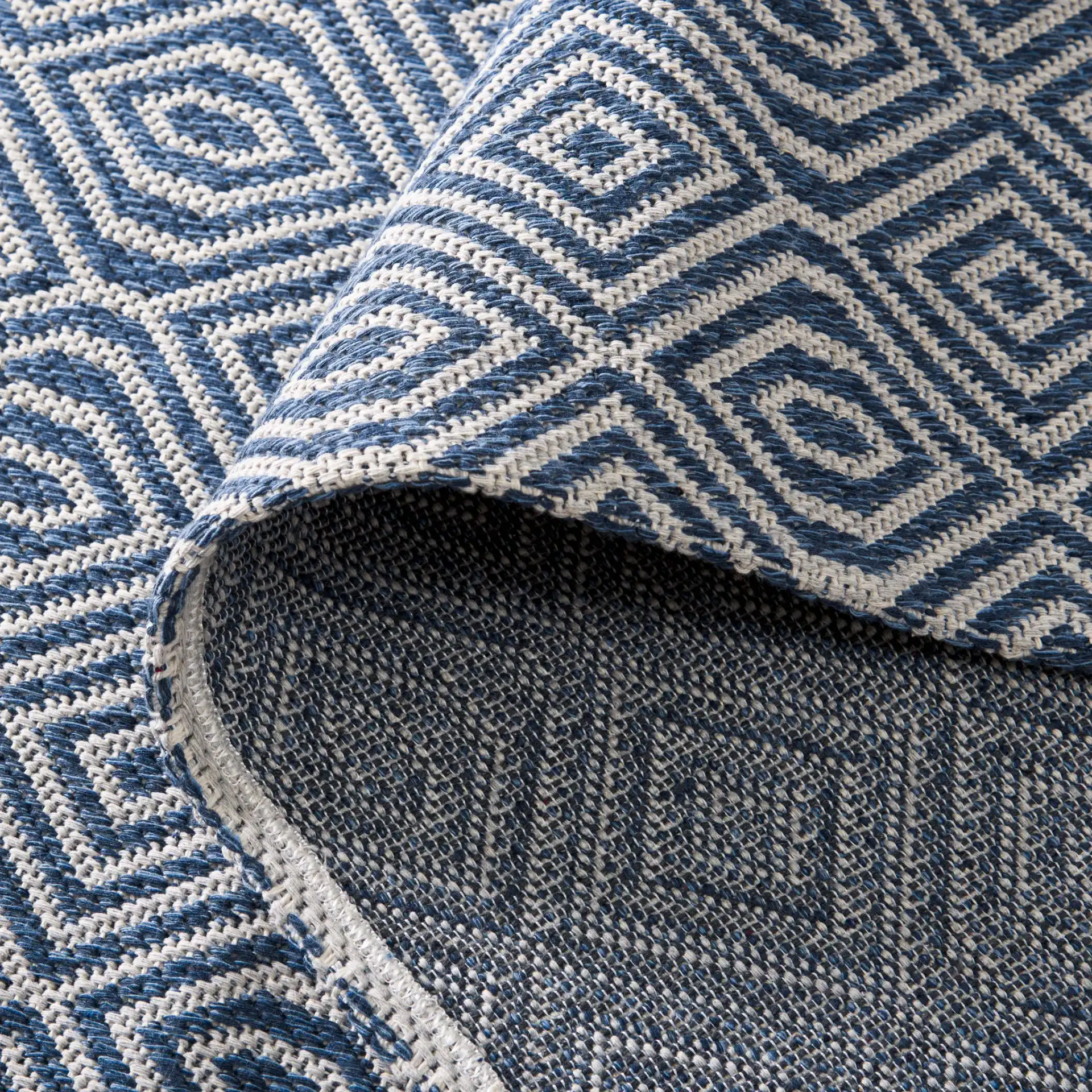 Martha Stewart Concentric Diamond Cotton Rug in Martha Stewart Concentric Diamond Cotton Rug in a styled room