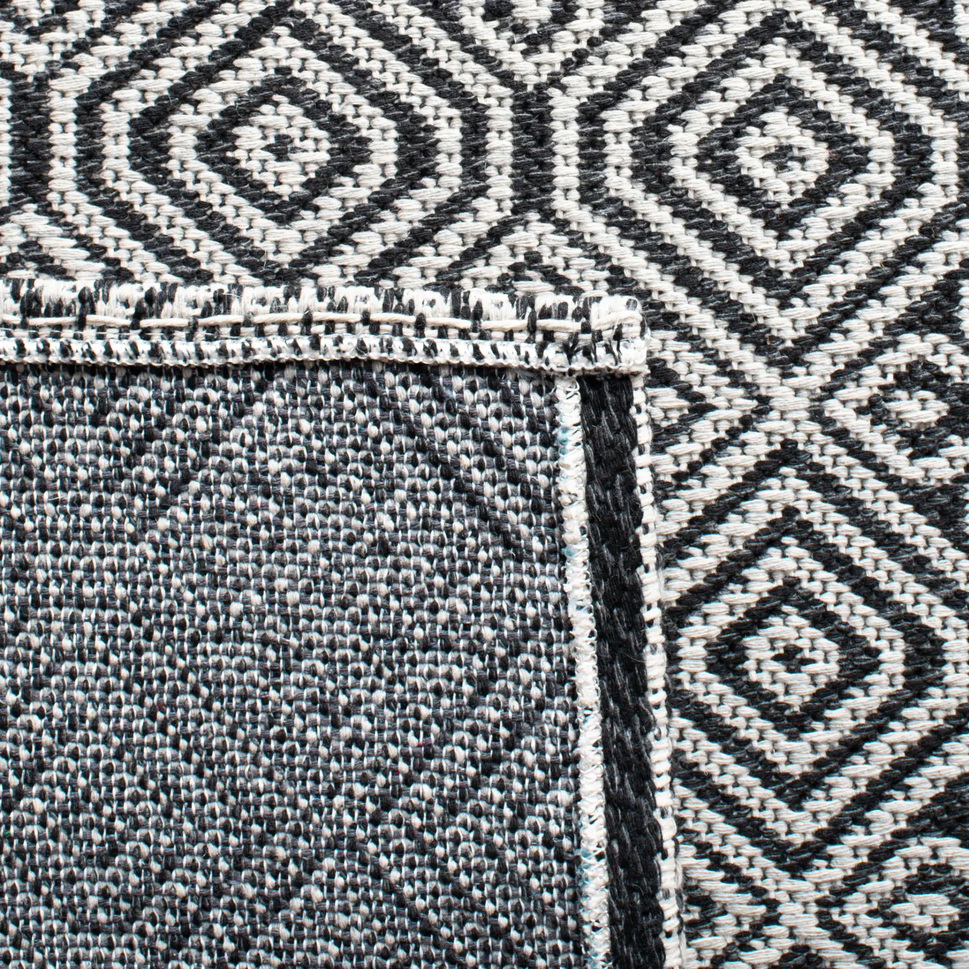 Martha Stewart Geometric Diamond Cotton Rug in Martha Stewart Geometric Diamond Cotton Rug in a styled room