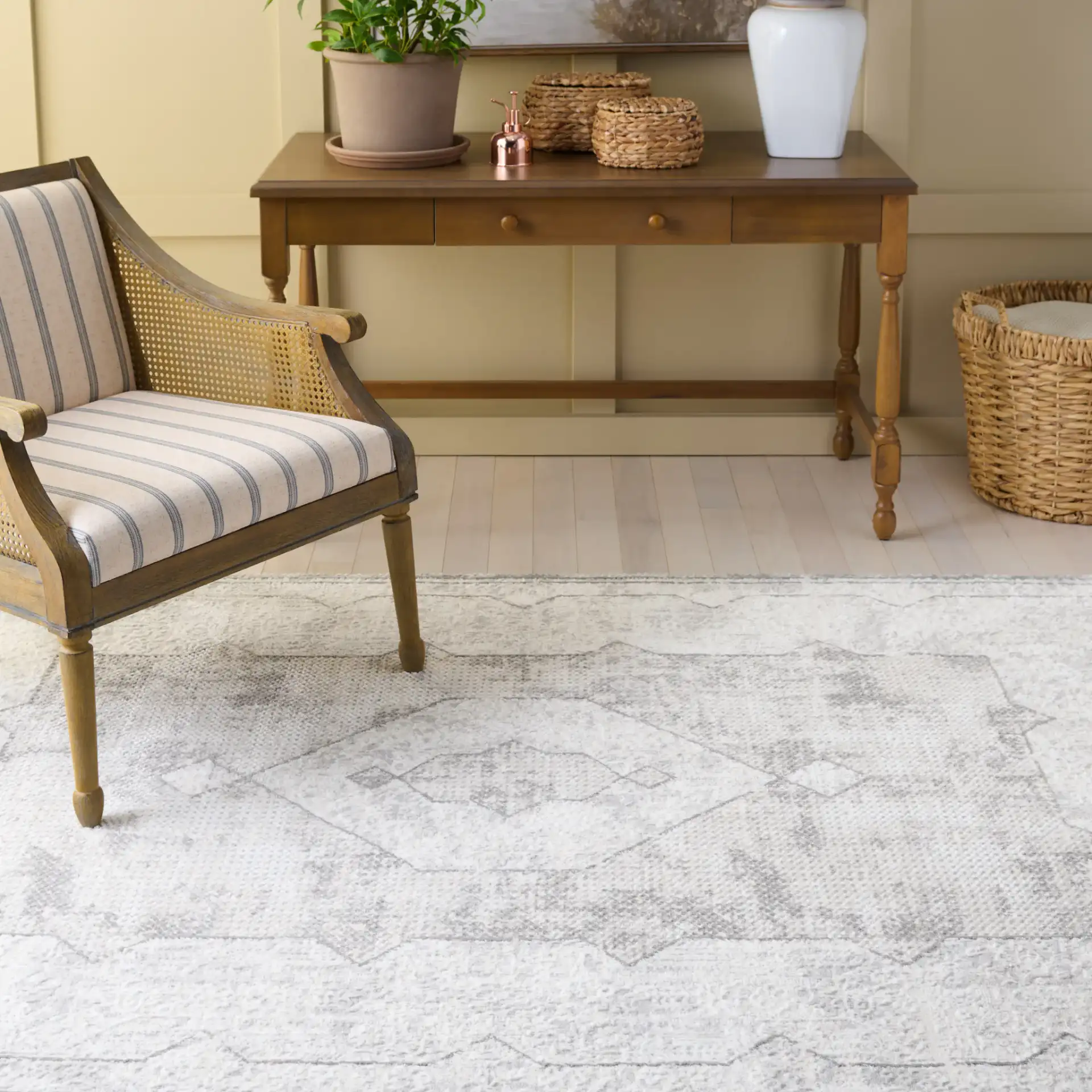 Martha Stewart Easton Distressed Medallion Rug in Ivory / Gray in a styled room