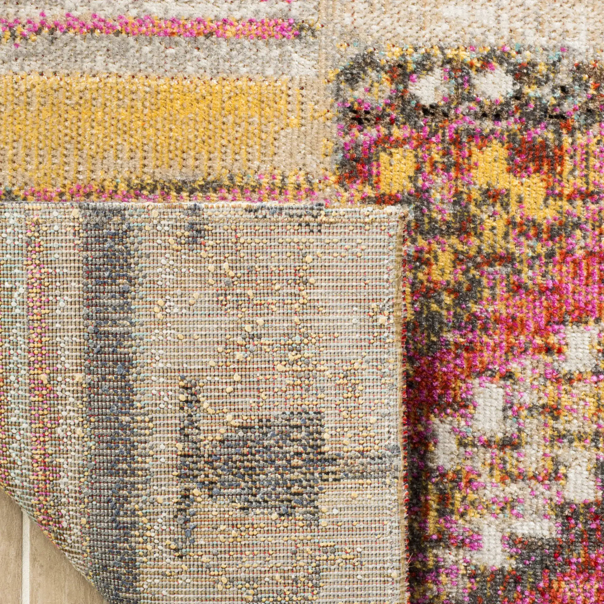 Montage Patchwork Panel Outdoor Rug in Taupe / Multicolor in a styled room