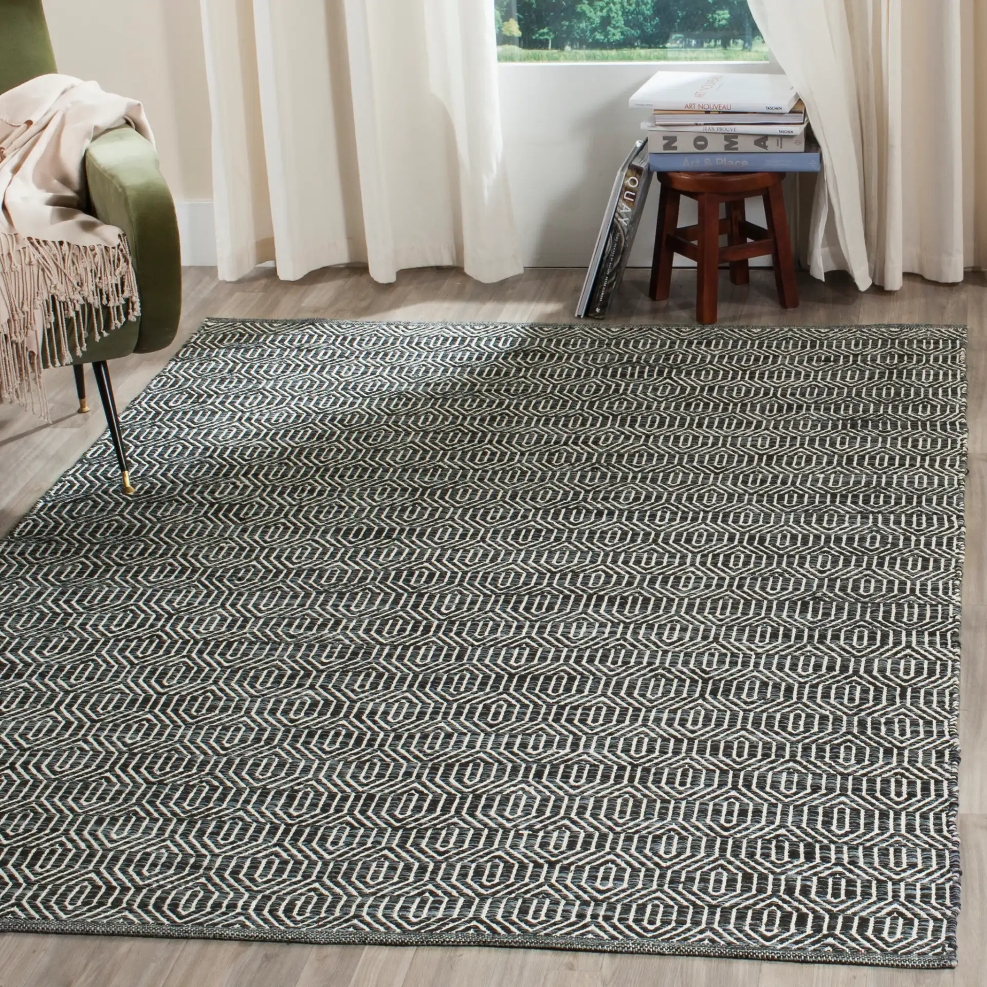 Montauk Nested Diamond Hand-Woven Cotton Rug in Ivory / Dark Gray in a styled room
