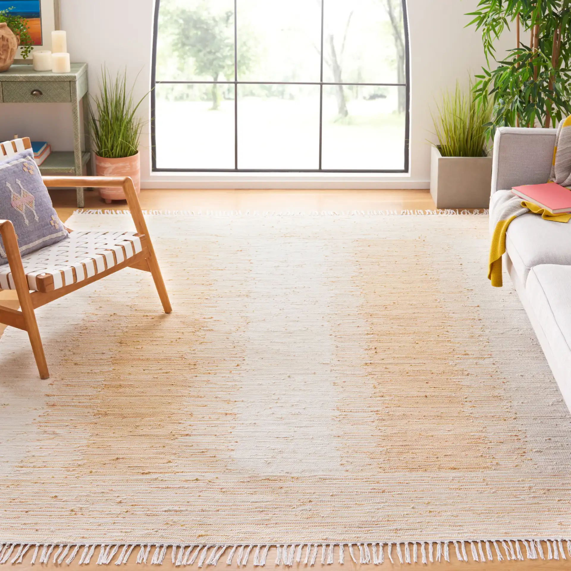 Montauk Double Vertical Stripe Hand-Woven Cotton Rug in Beige in a styled room