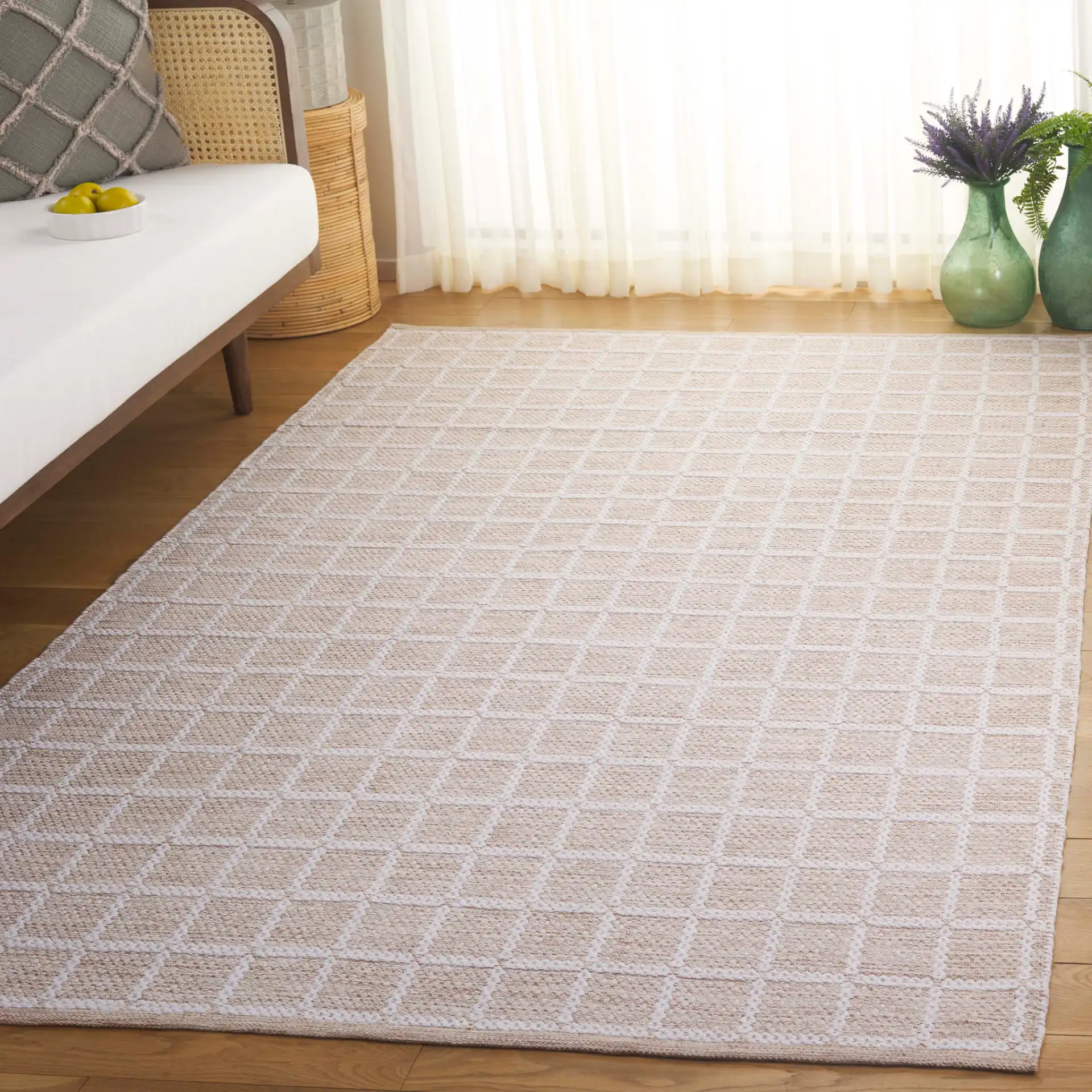 Montauk Waffle Grid Hand-Loomed Cotton Rug in Beige / Ivory in a styled room